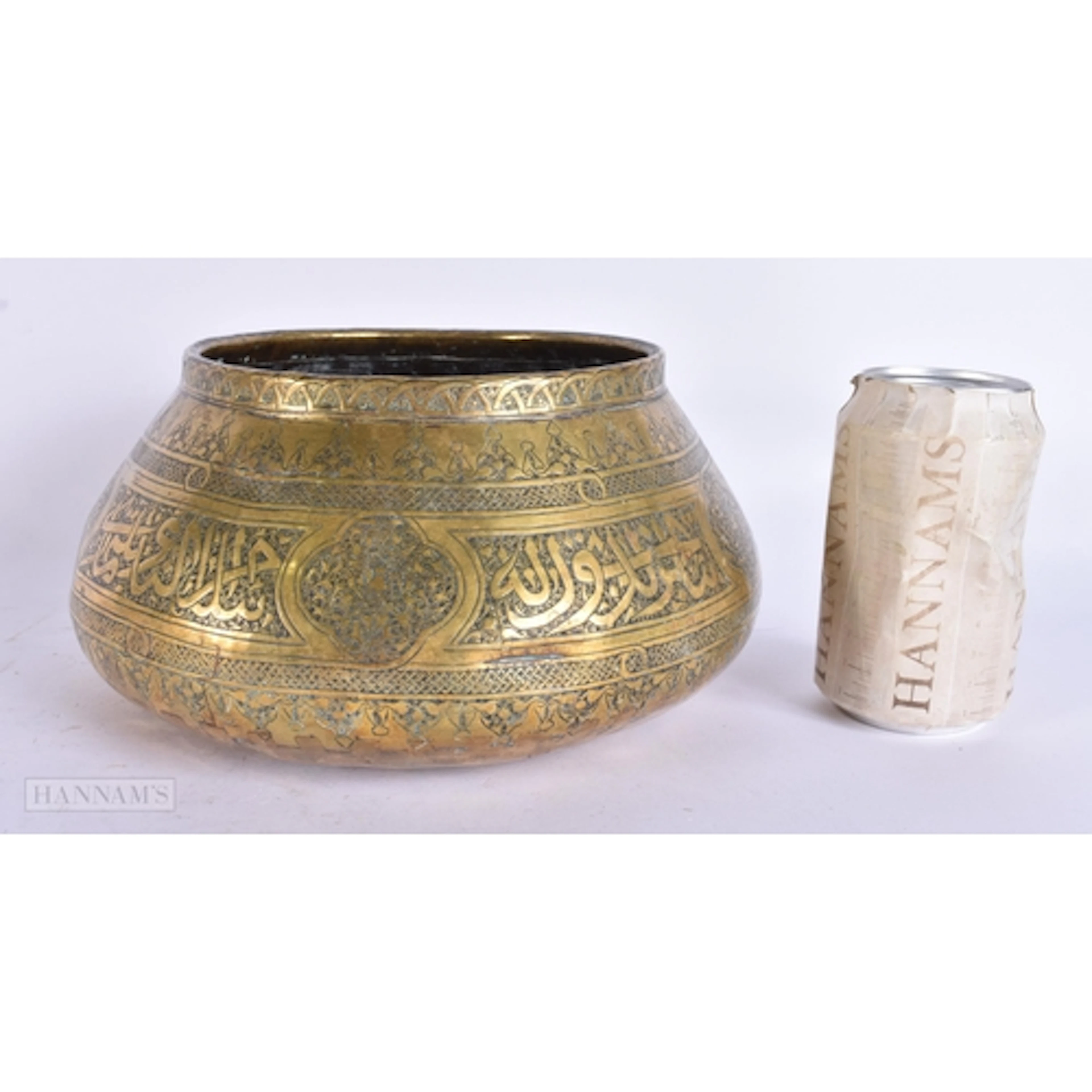 A 19TH CENTURY ISLAMIC MIDDLE EASTERN JAR decorated with Kuf...