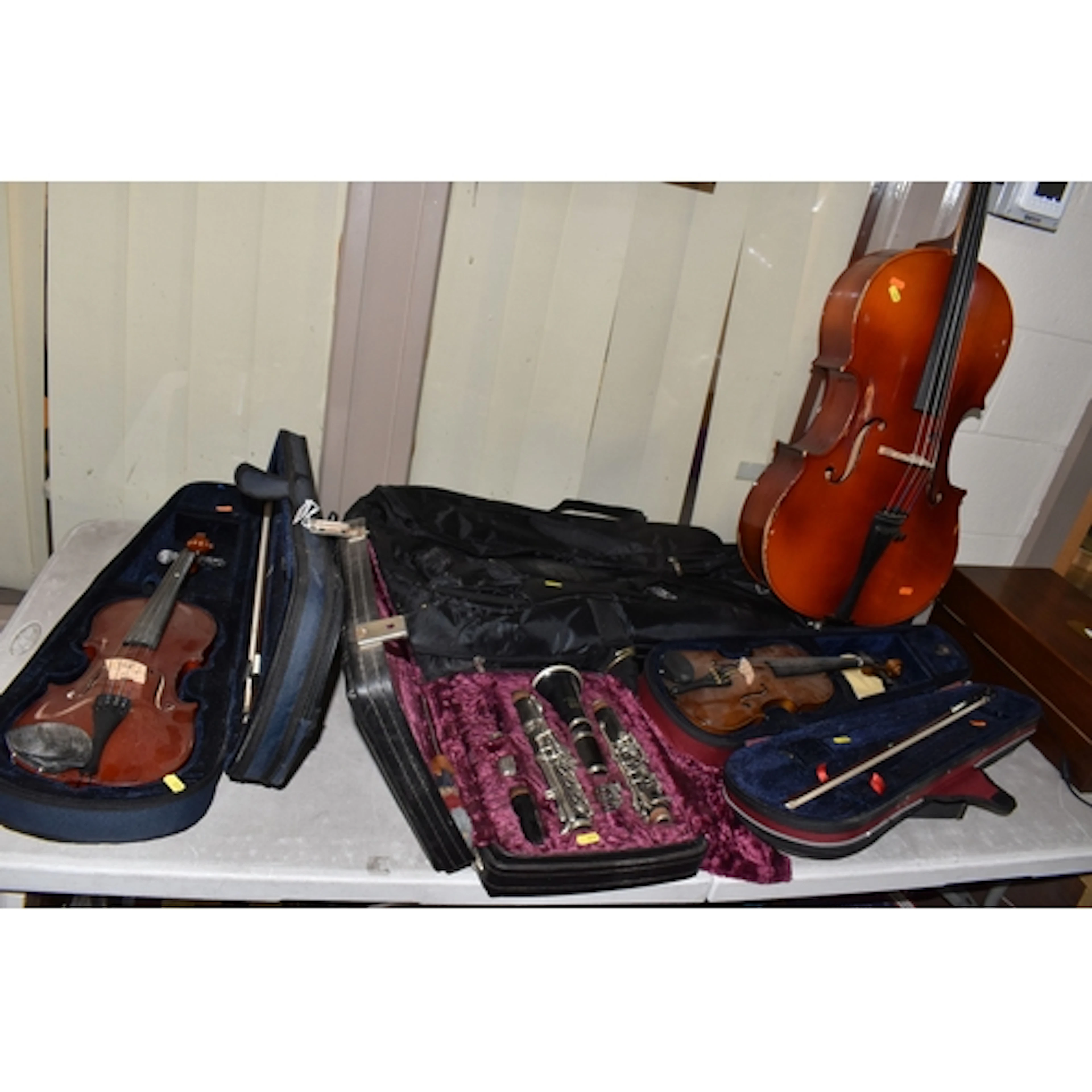 A GROUP OF VINTAGE MUSICAL INSTRUMENTS, to include a Boosey ...