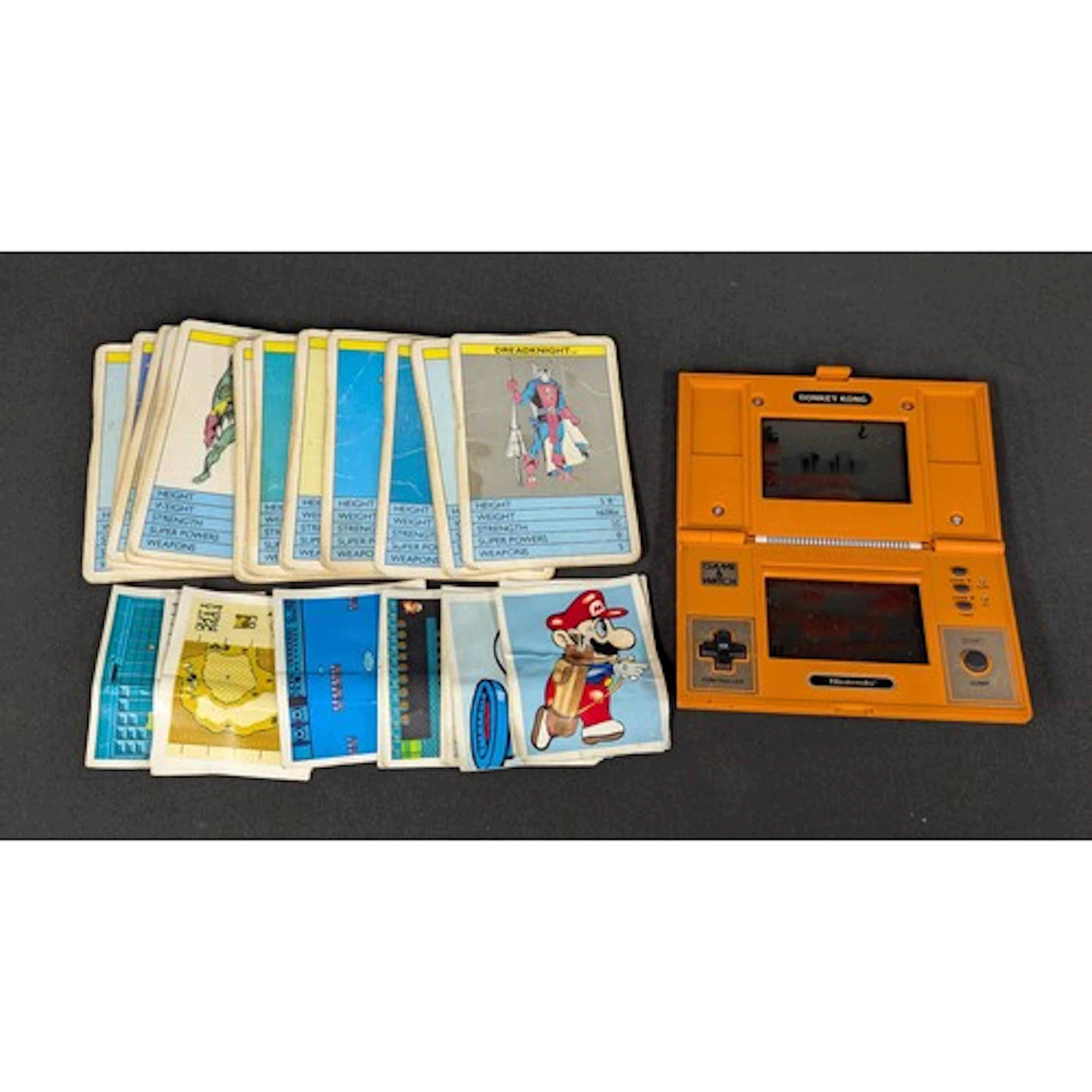 A Nintendo Game + Watch handheld multiscreen electronic cons...
