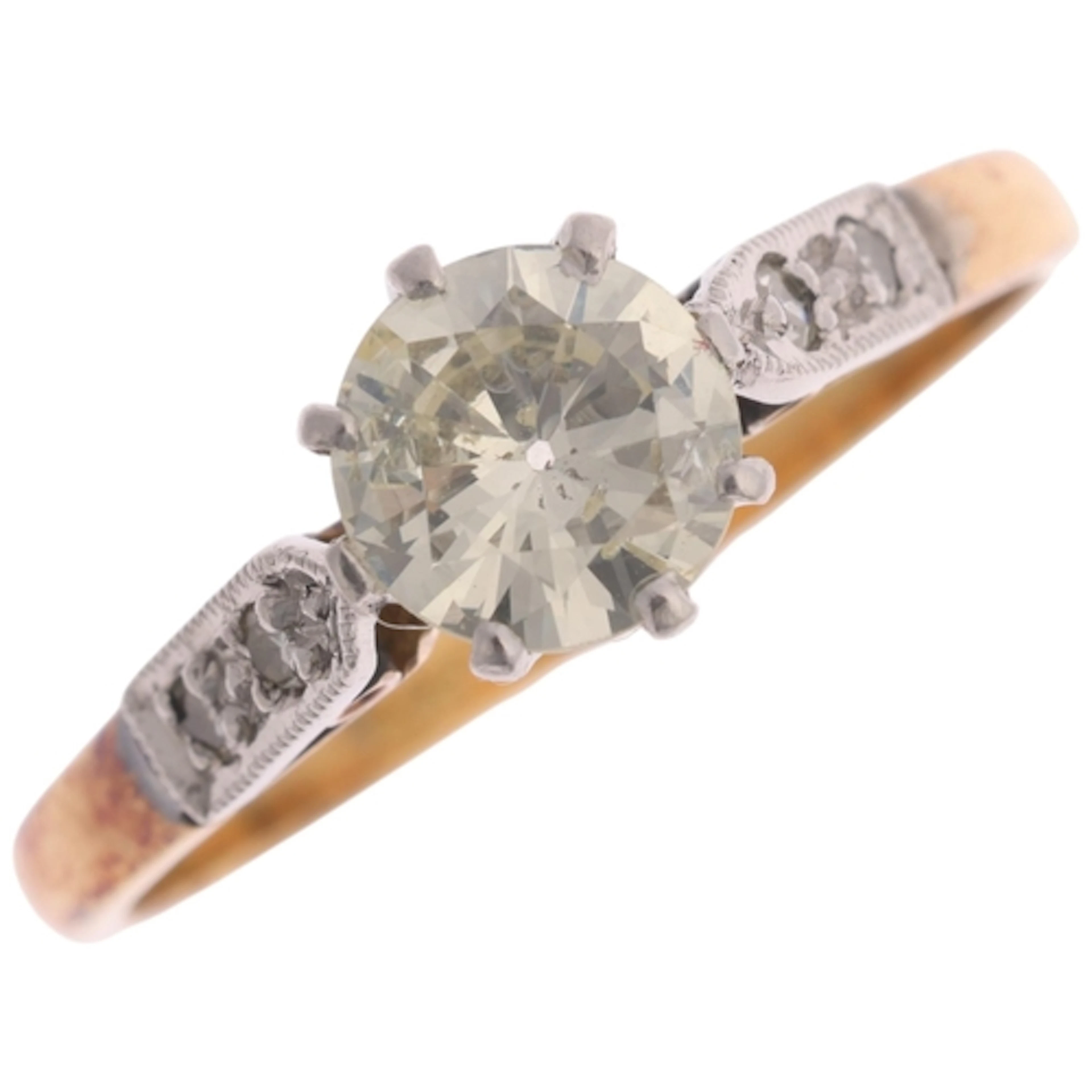 An 18ct gold 0.65ct single stone diamond ring, platinum-topp...