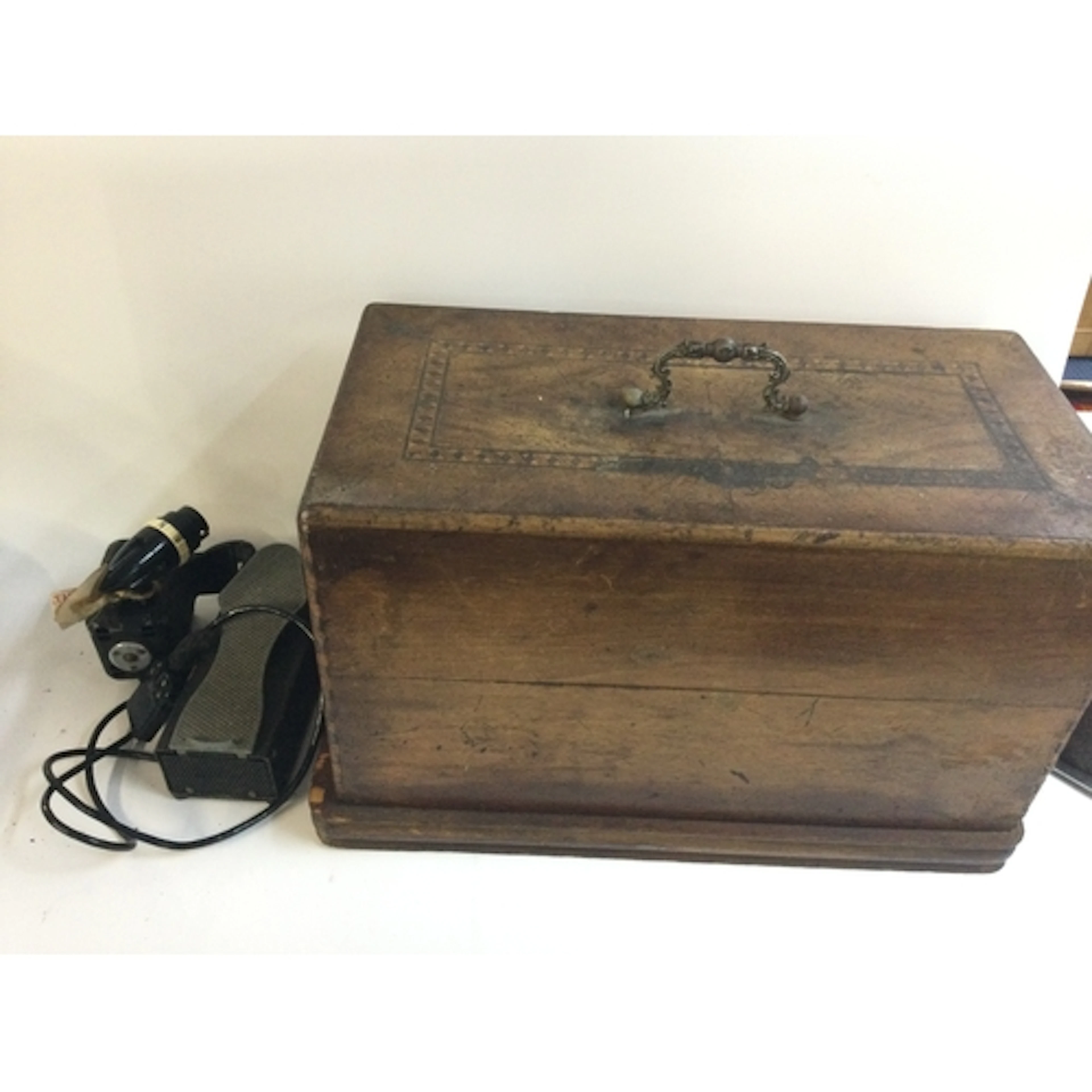 Locked sewing machine and pedal
