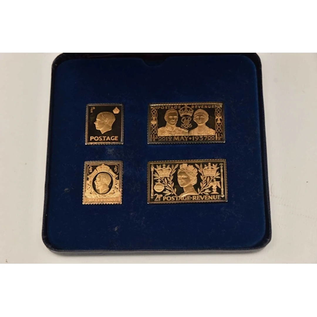 Silver. A presentation case containing four medallions depic...