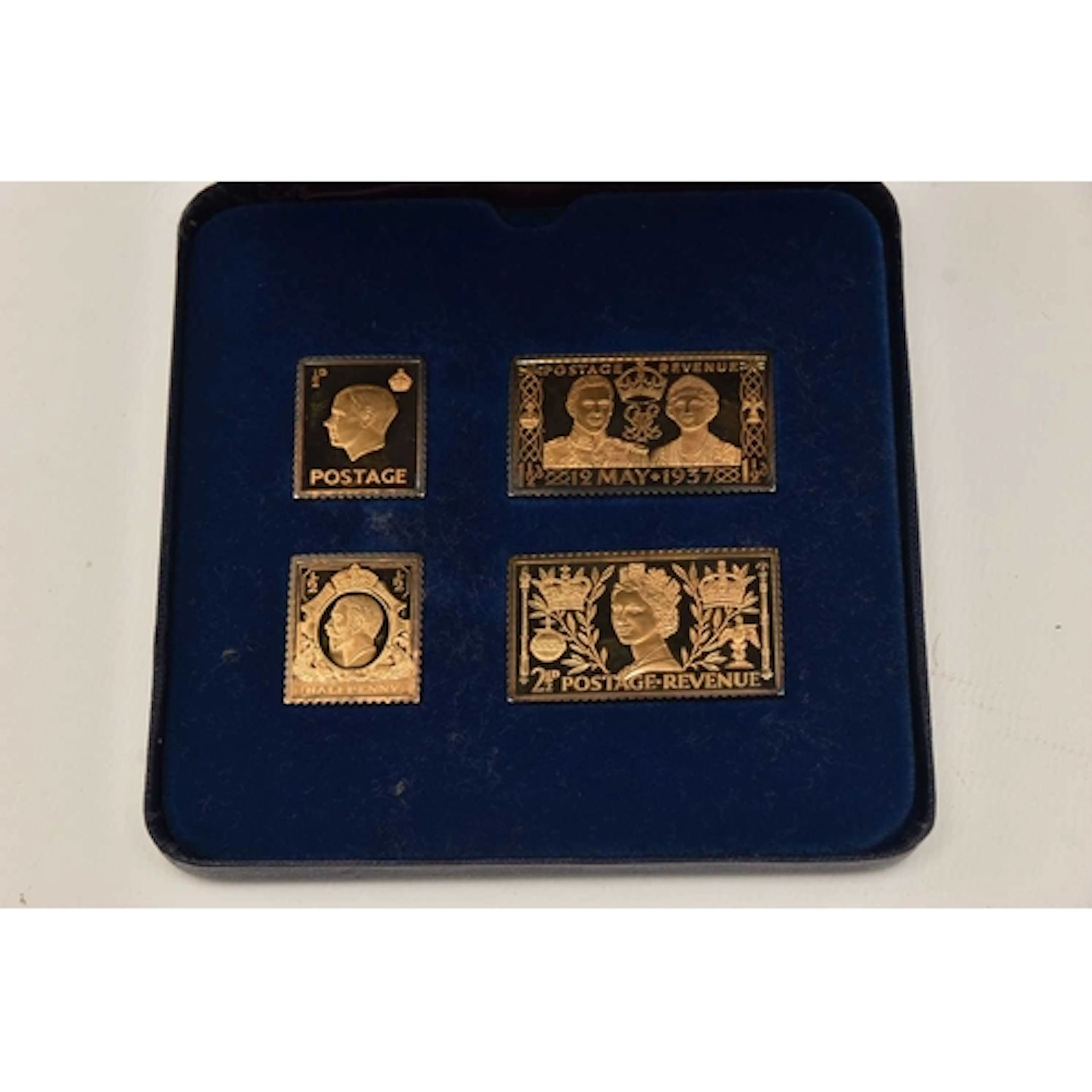 Silver. A presentation case containing four medallions depic...