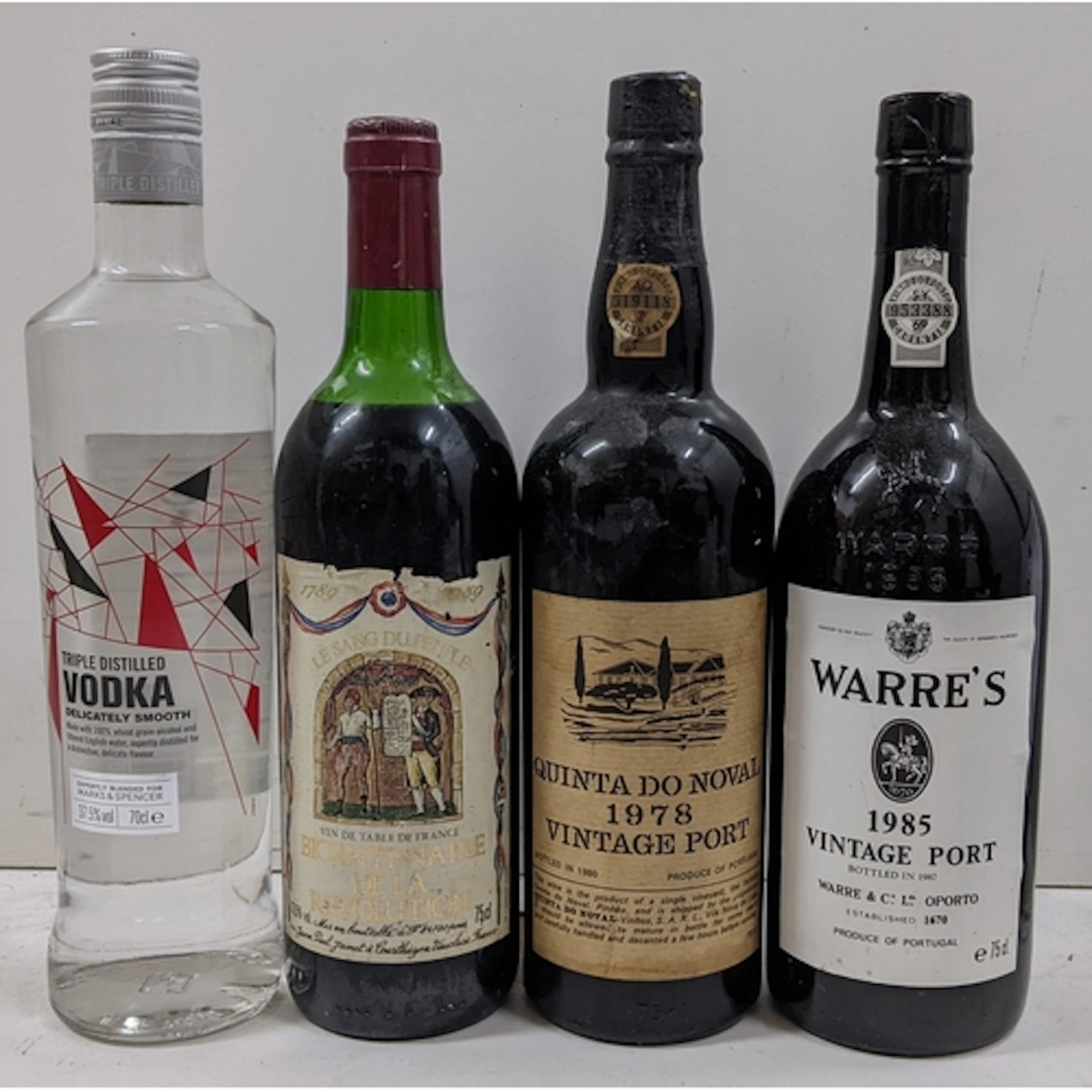 A mixed group of vintage wines and spirits, comprising: Le S...