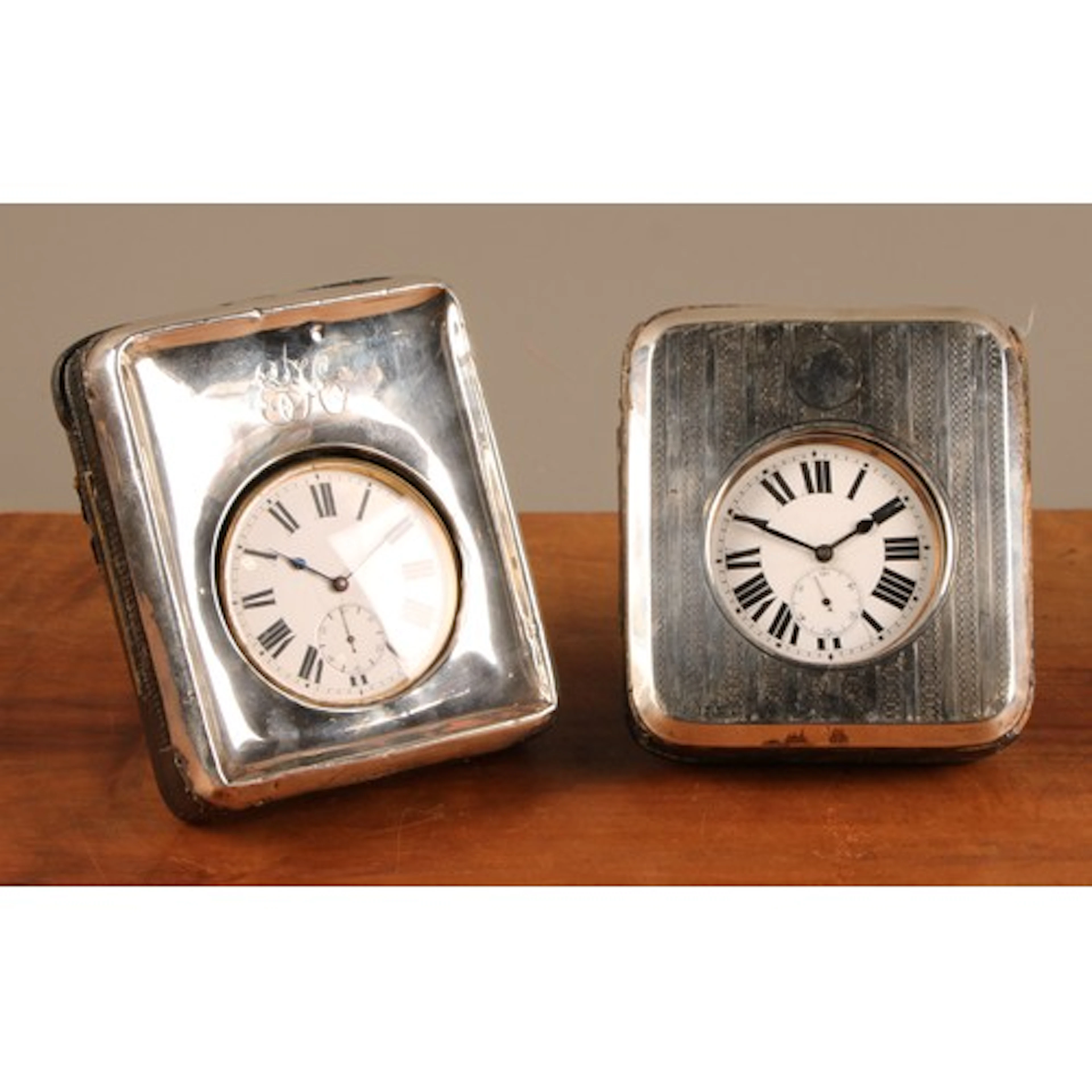 An Edwardian silver mounted travelling timepiece case, engin...