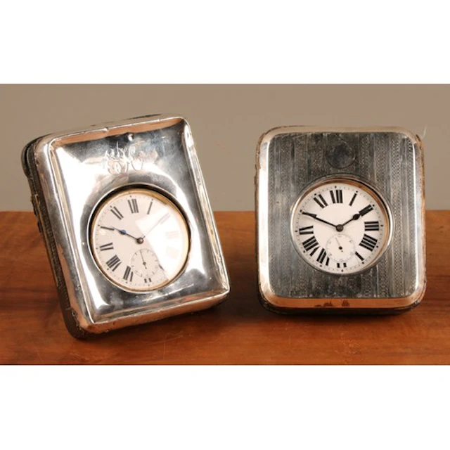 An Edwardian silver mounted travelling timepiece case, engin...