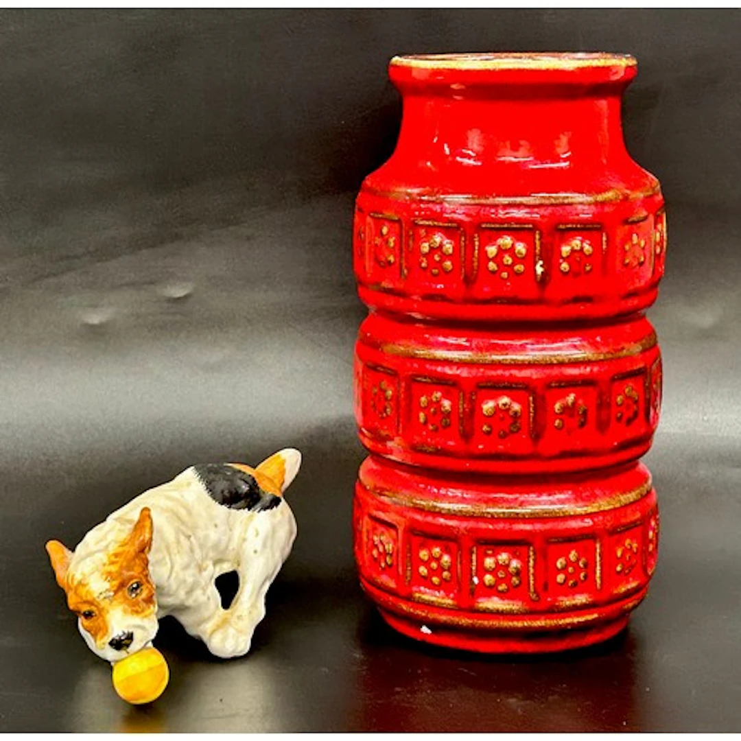 A Royal Doulton model dog HN1097 and a West German vase mode...