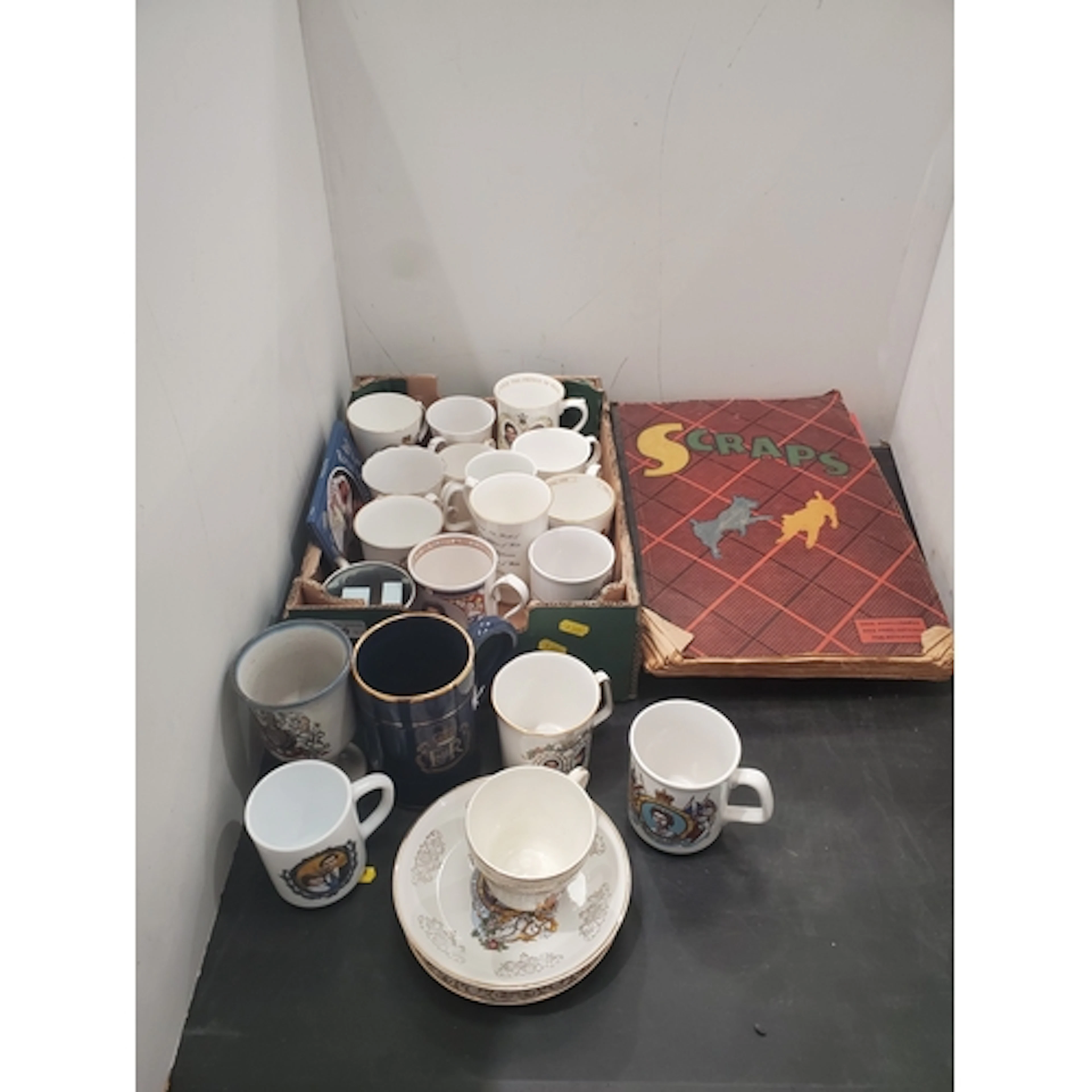 A collection of Royal Commemorative Mugs, two Books and a Sc...