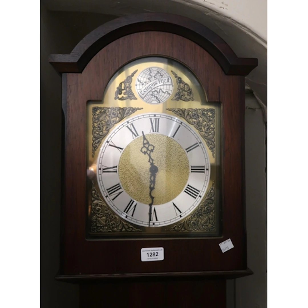 Modern grandmother clock with brass dial, having silvered ch...