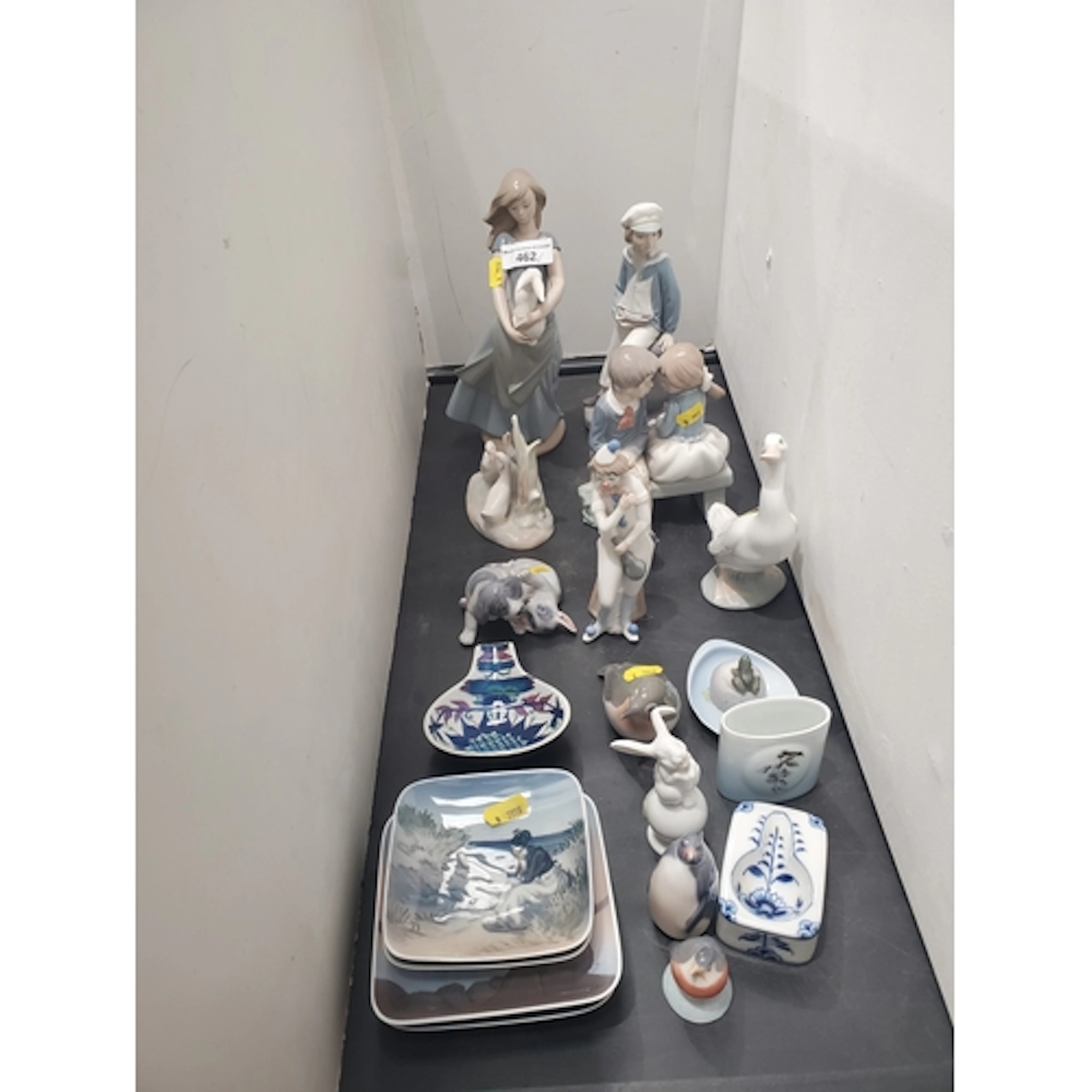 Five Nao Figurines, a Royal Copenhagen Figure of puppies, tw...