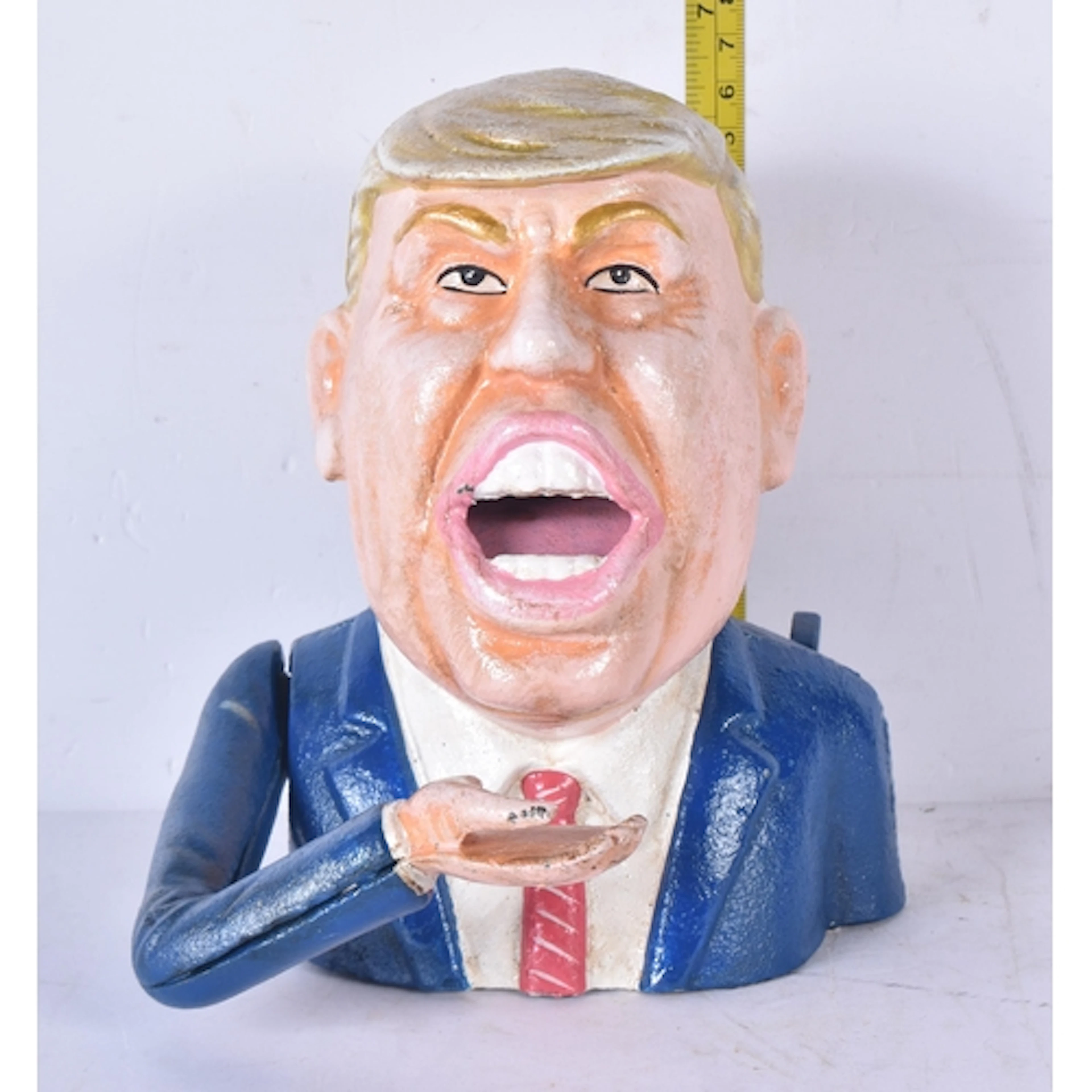 A Cast iron Donald Trump money box 18cm