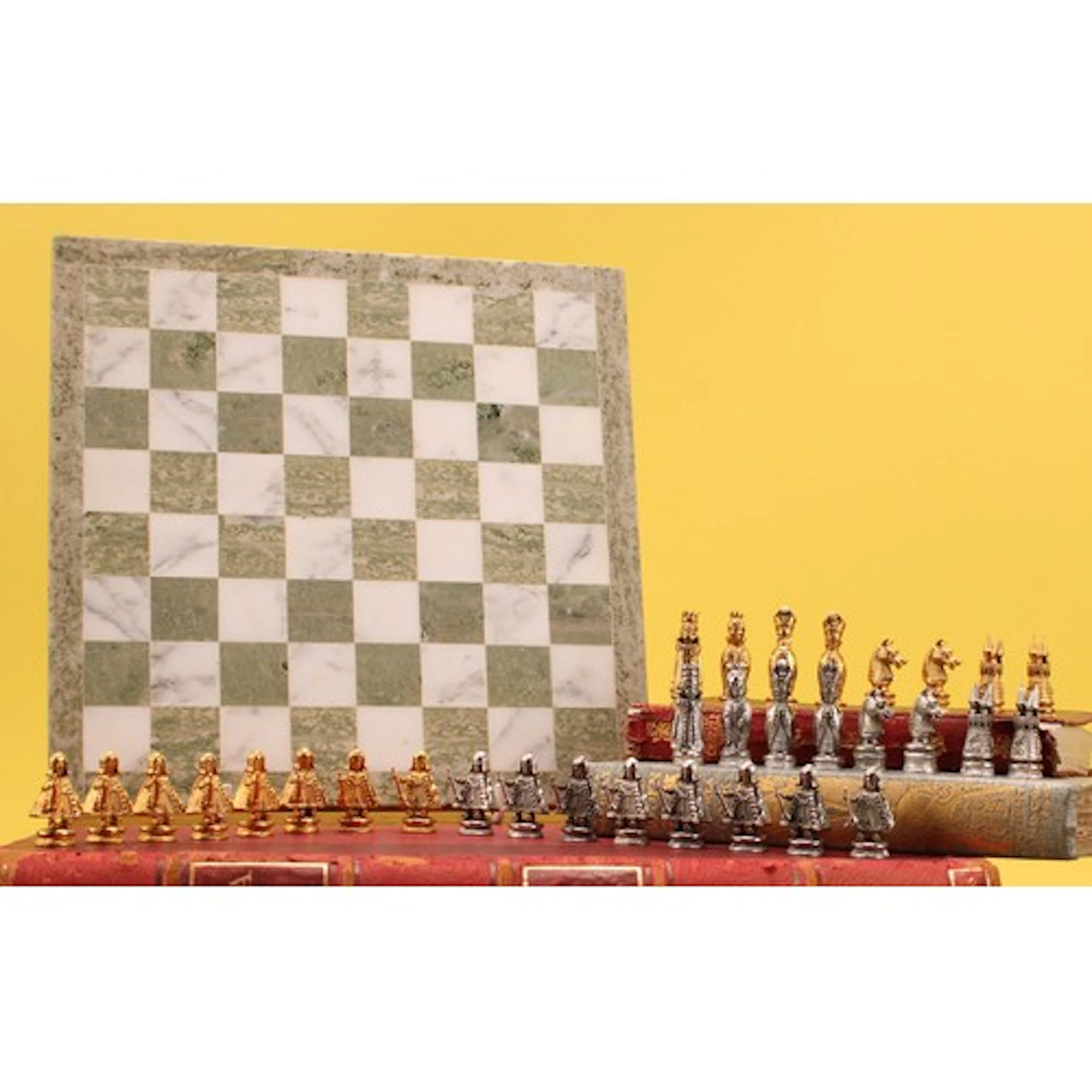 An Asprey and Co. 9ct gold chess set, the pieces in white an...
