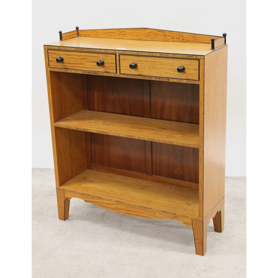 Good quality satinwood and ebony open bookcase with a low ga...