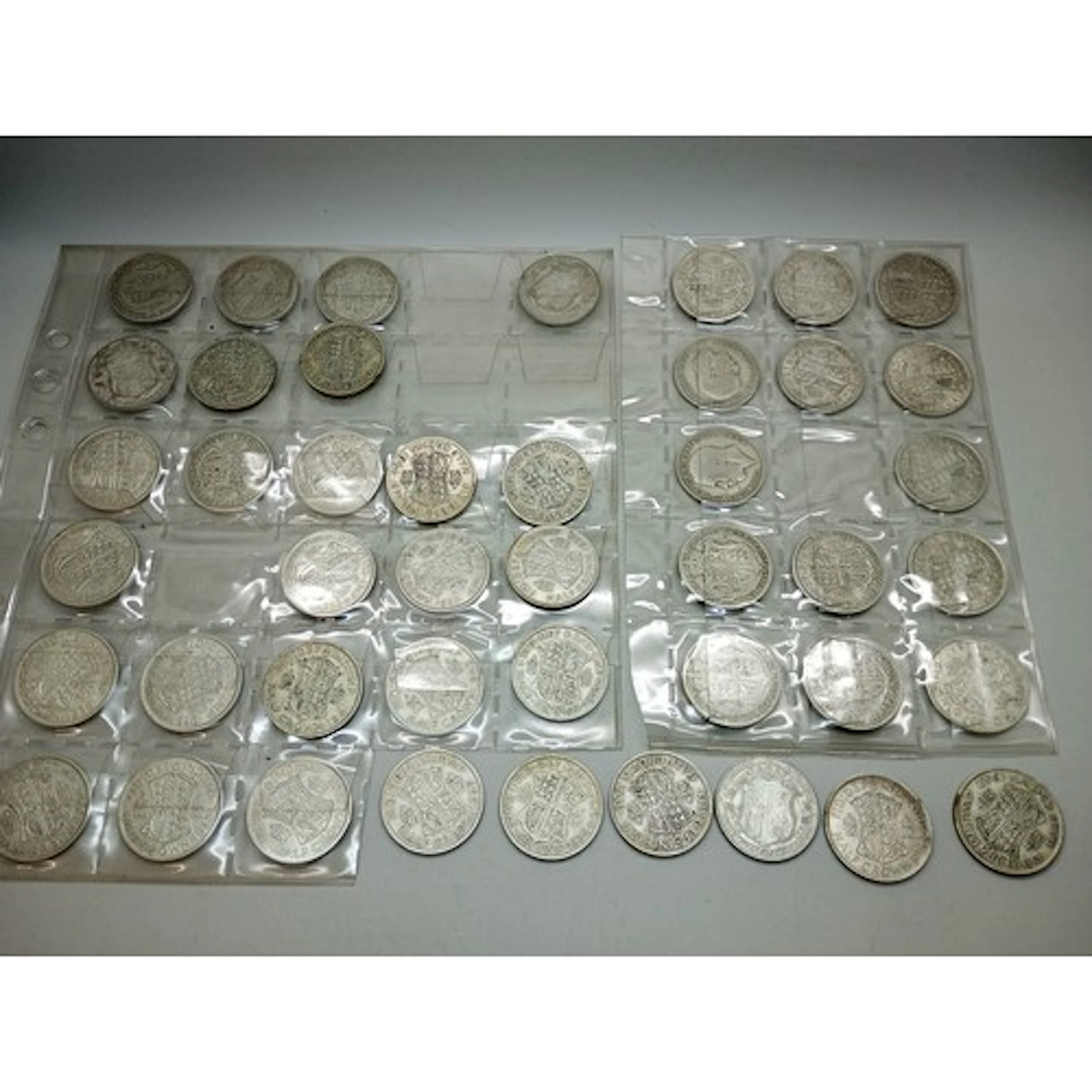 A large collection of half silver half crowns