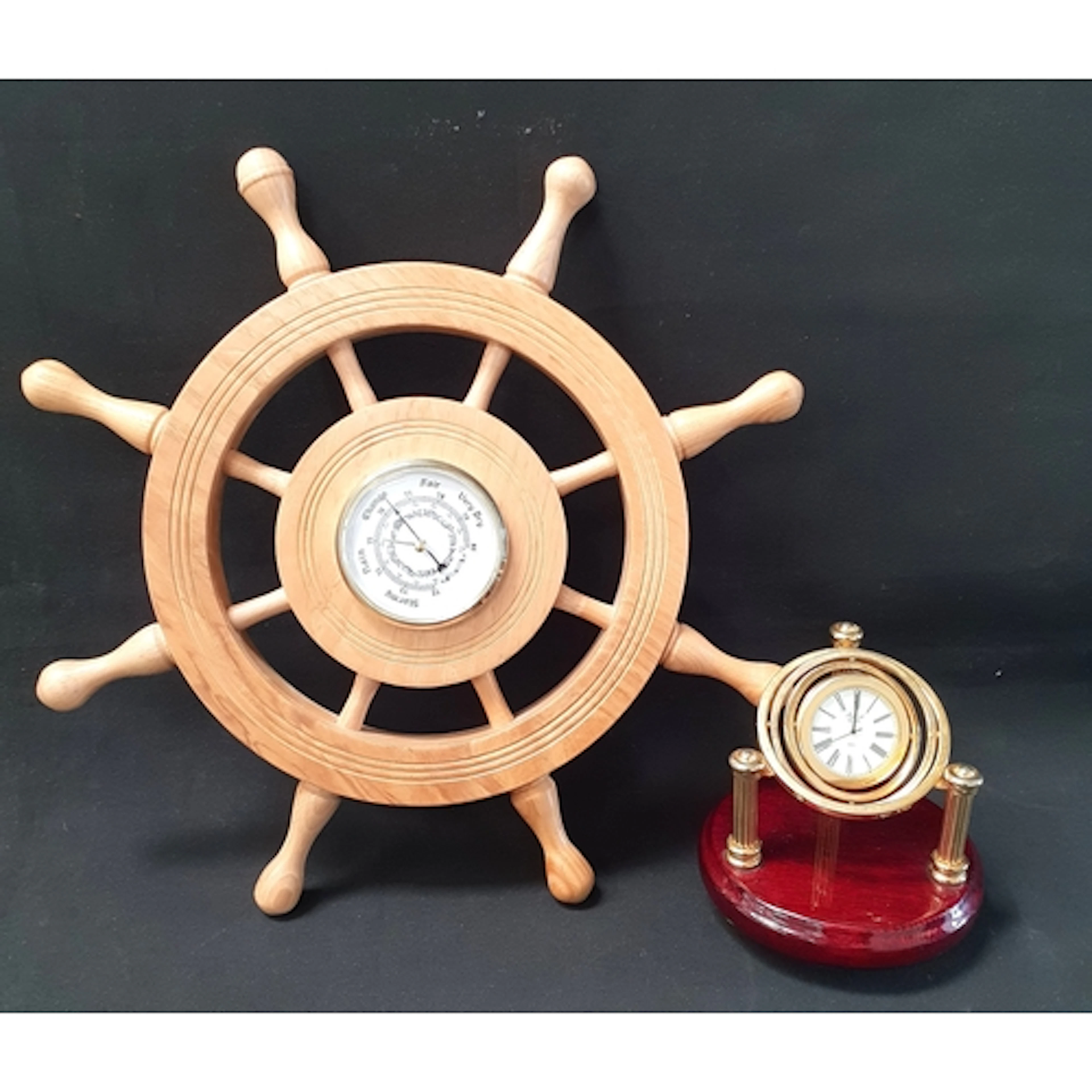 RAPPORT GIMBAL DESK CLOCK the circular brass-cased clock fa...