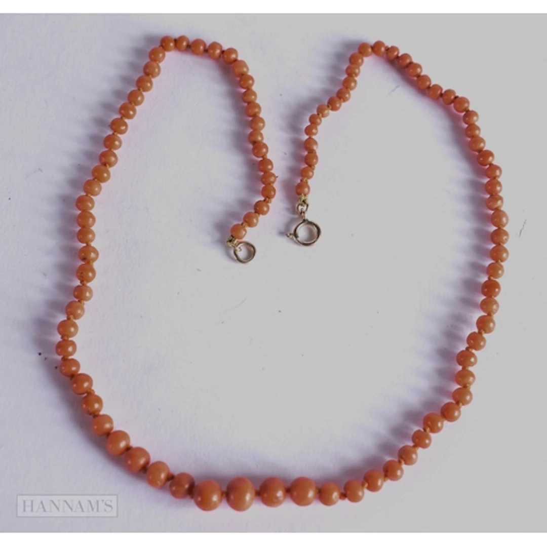 AN ANTIQUE CORAL NECKLACE. 12.5 grams. 47 cm long.