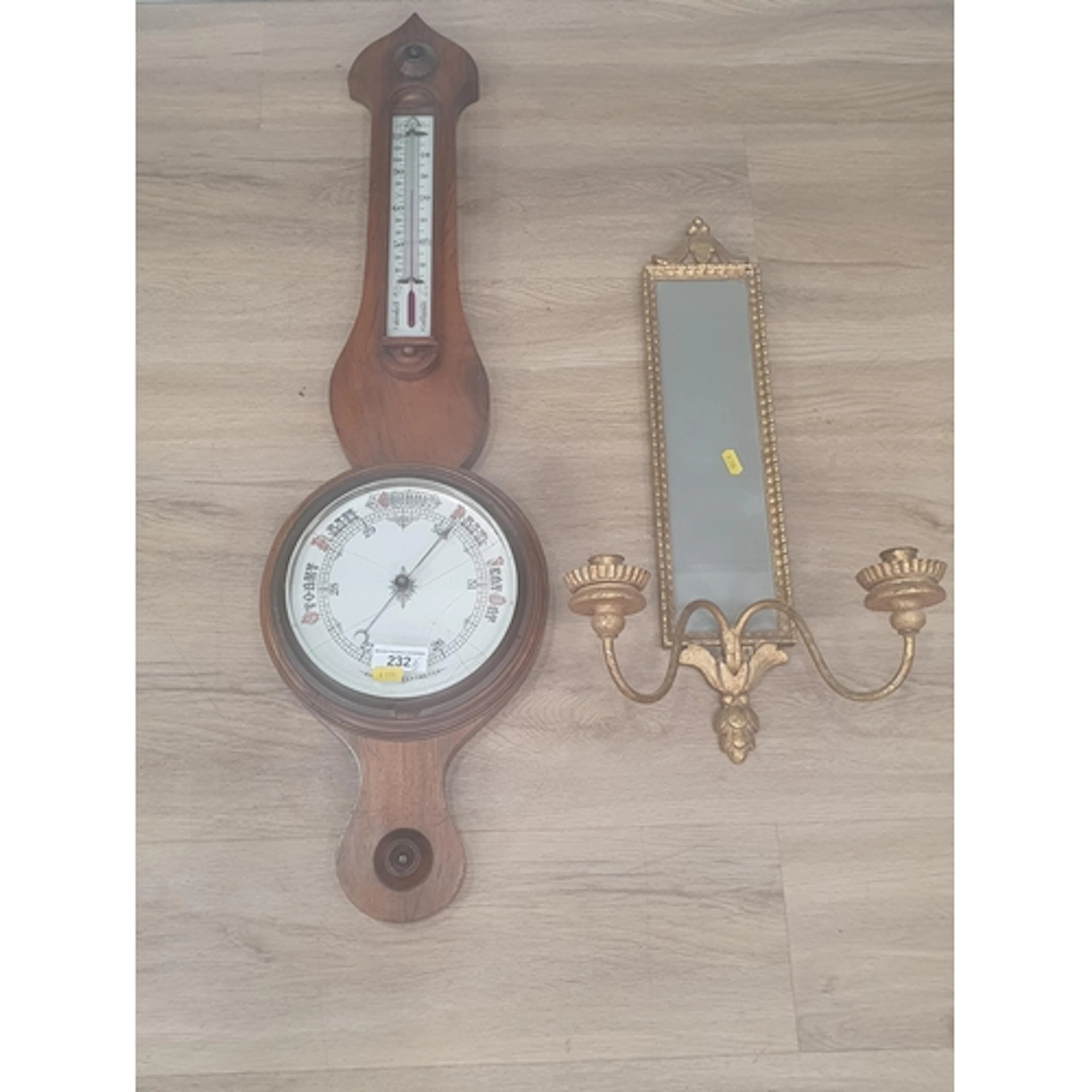 A Victorian walnut cased Aneroid Barometer with ceramic dial...