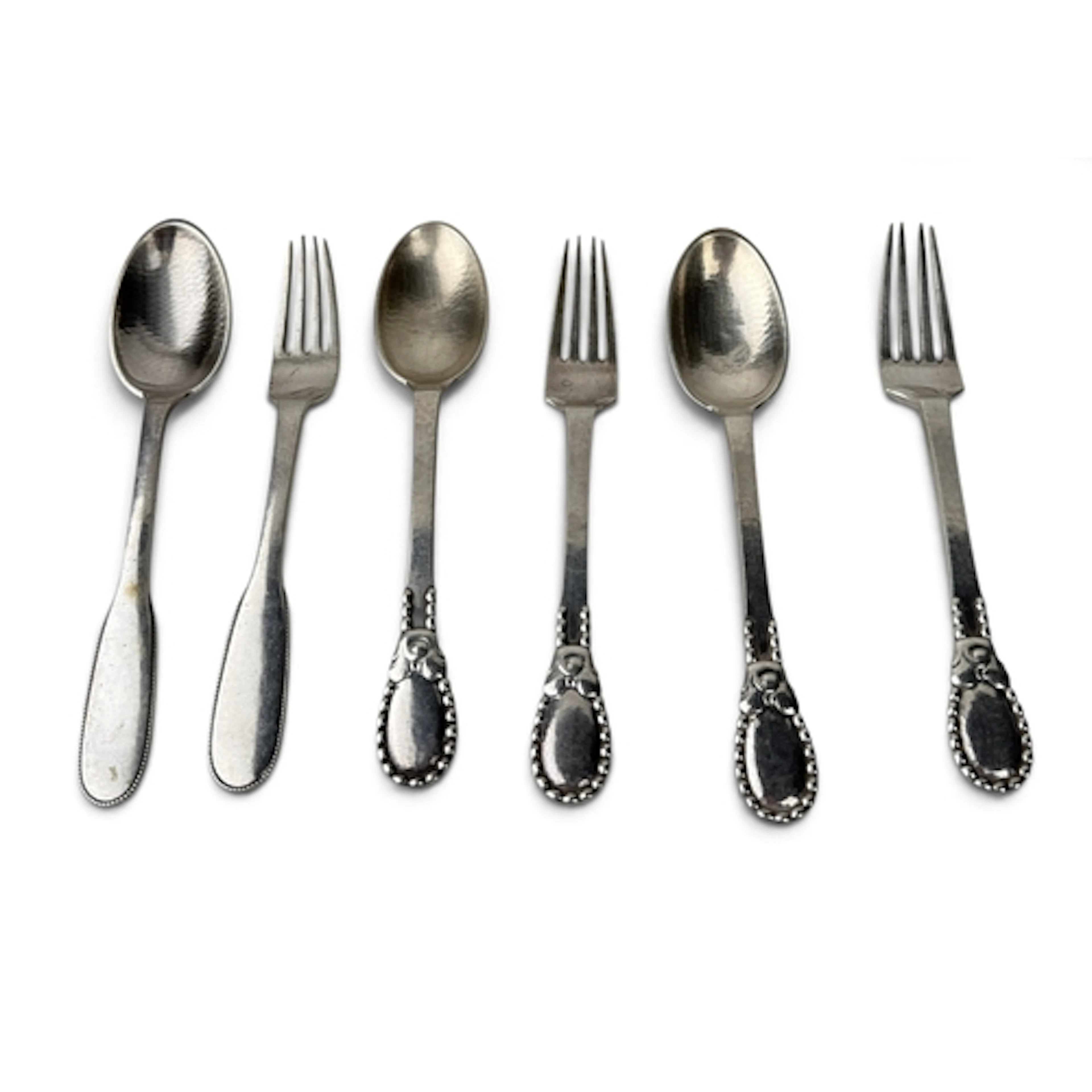EVALD NIELSEN: THREE PAIRS OF DANISH SILVER SPOONS AND FORKS...