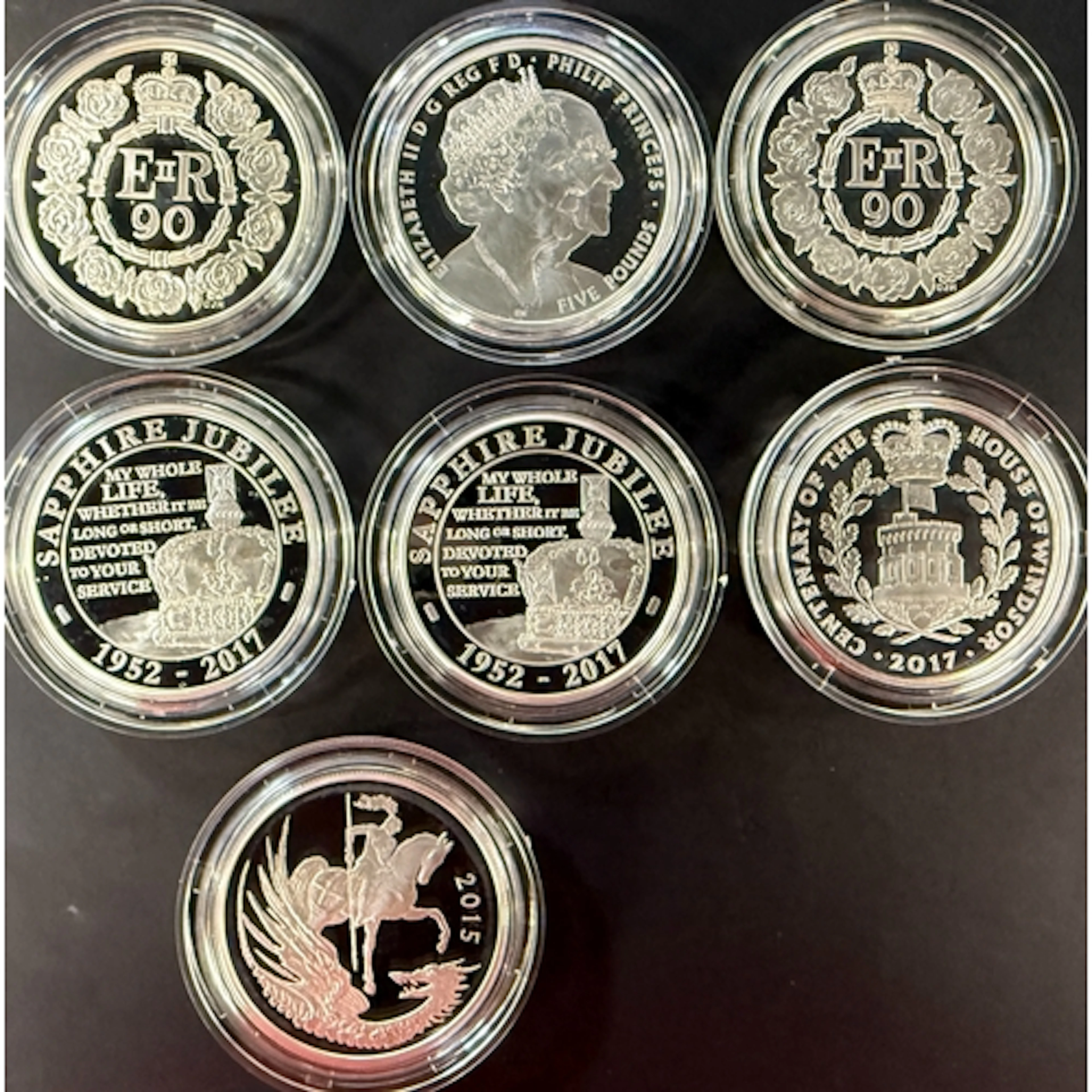A group of seven UK QEII £5 silver proof coins, comprising 2...