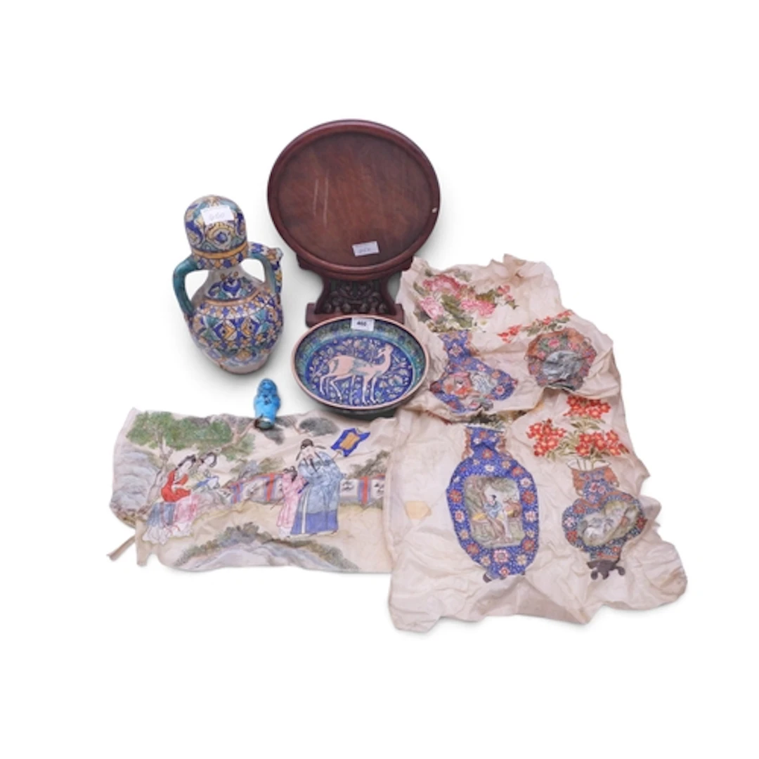 A Persian polychrome bowl Painted with a deer am...