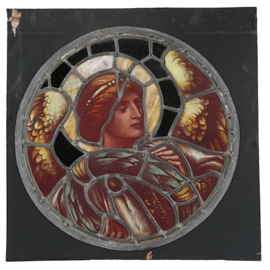 A Pre-Raphaelite period stained and leaded glass window roun...