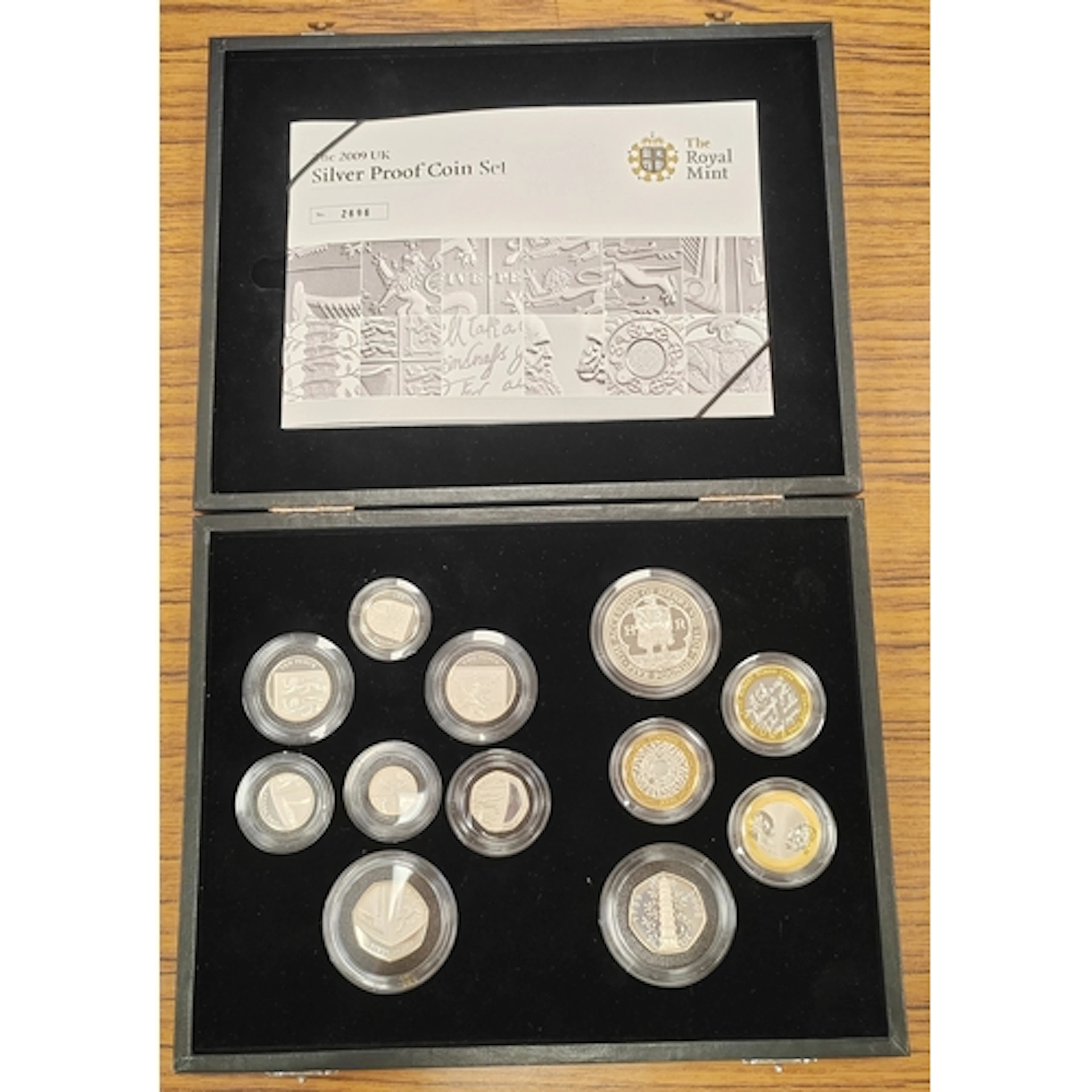 2009 silver proof cased set of 12 FDC, includes 2009 50p Kew...