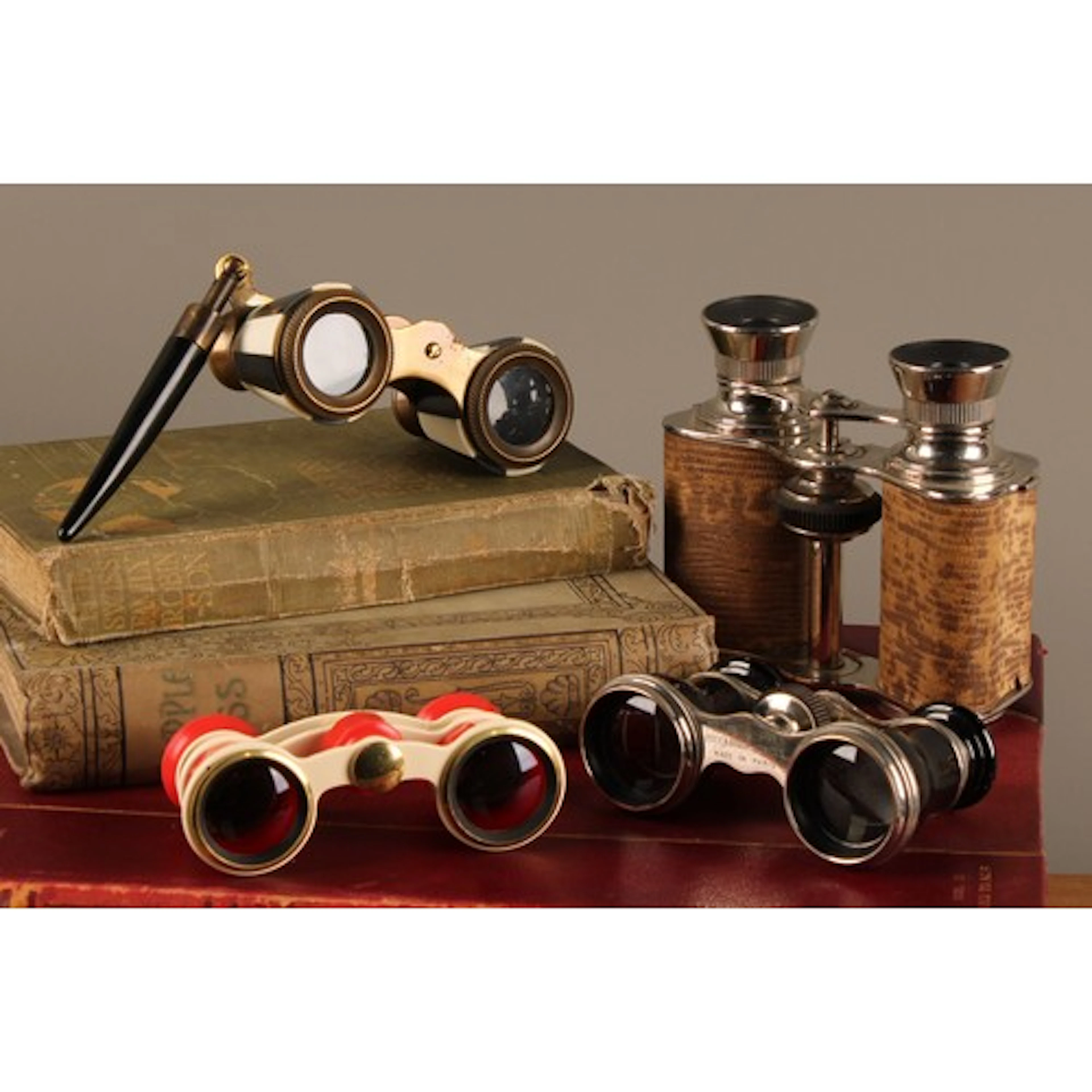 A pair of French faux-tortoiseshell opera glasses, the nose ...