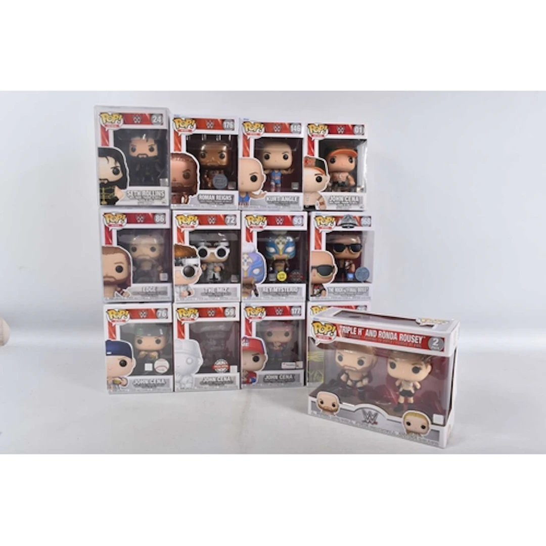 THIRTEEN BOXED FUNKO POPS! WWE VINYL FIGURES, including a Jo...