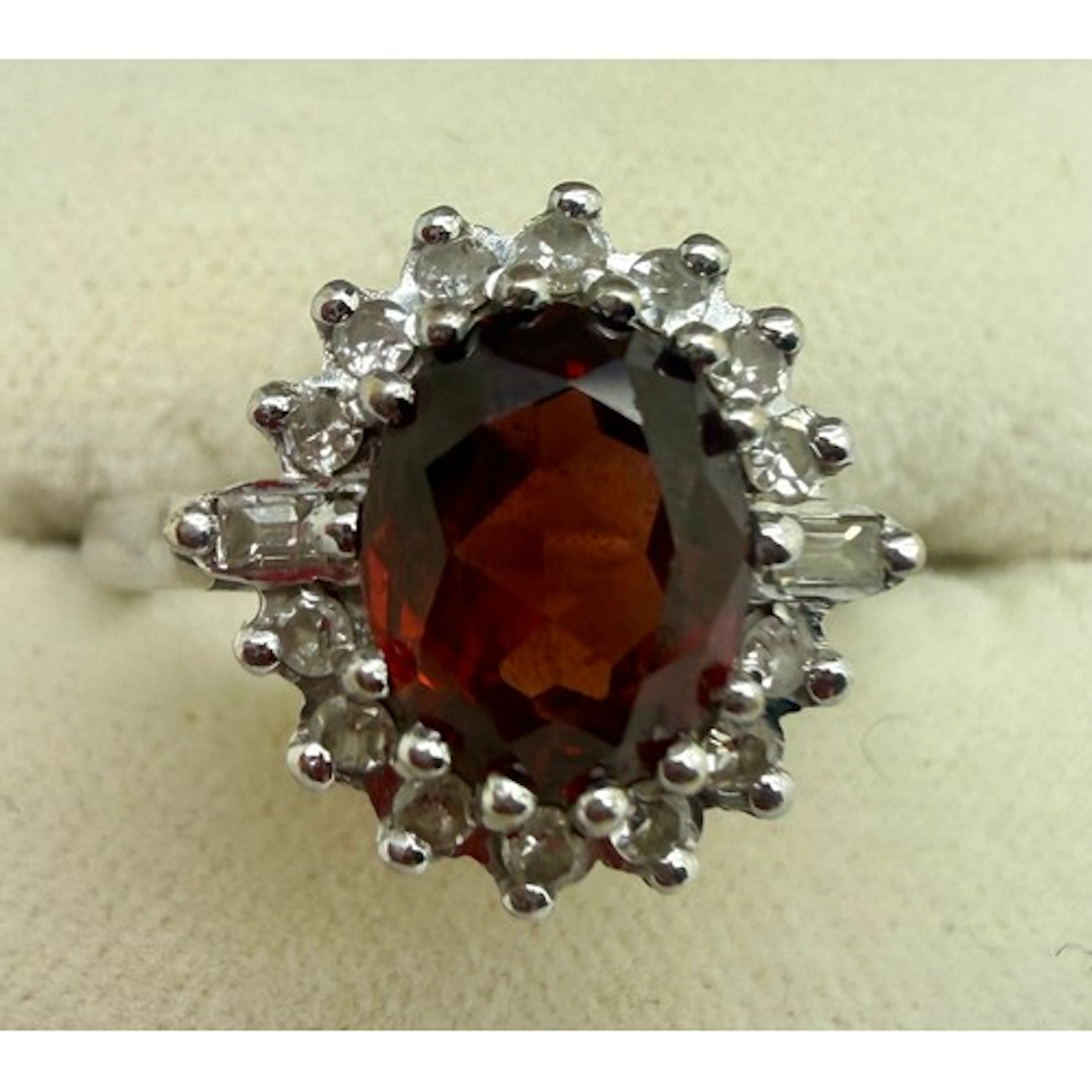 A diamond and pink stone cluster ring set in 18 carat white ...