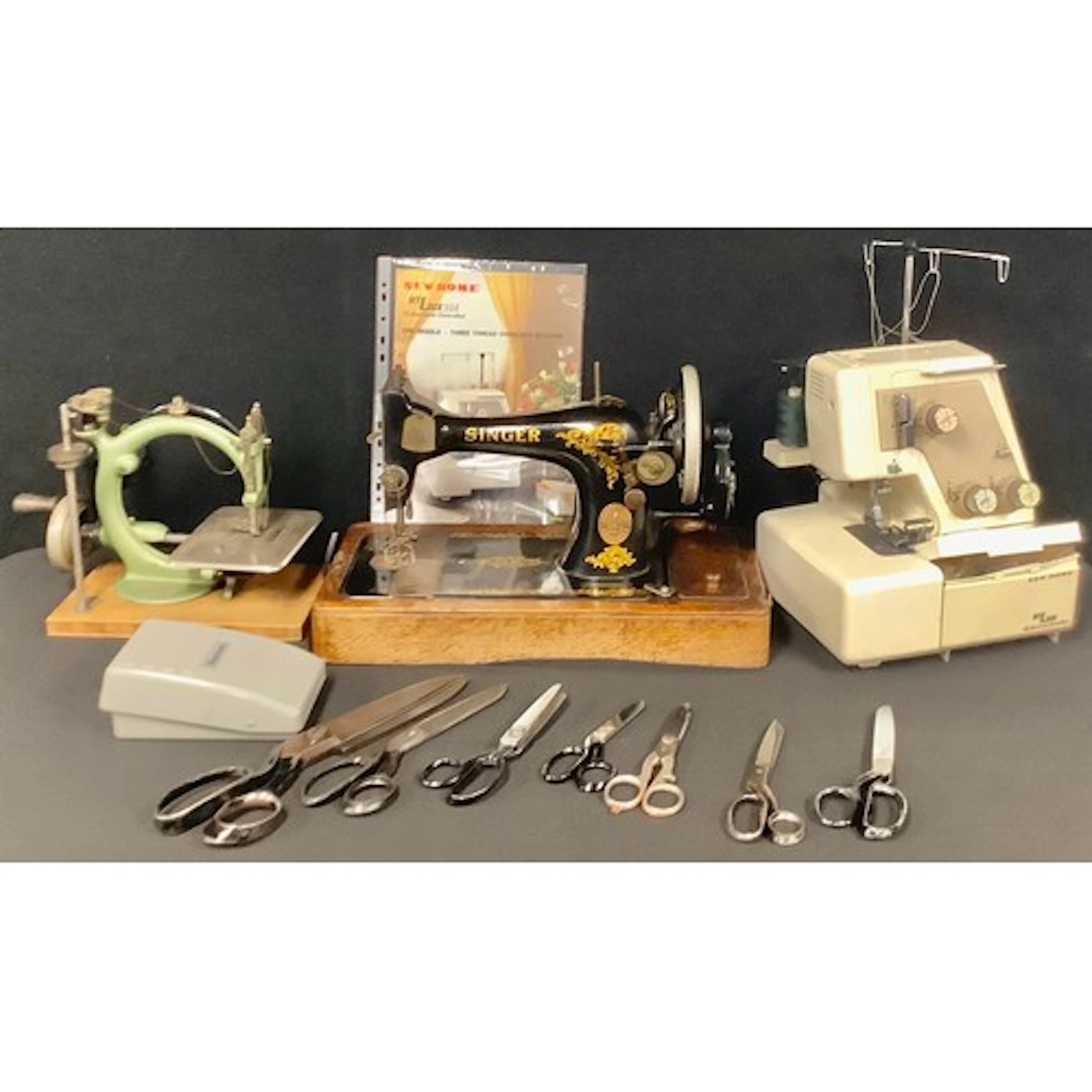 A 19th century Willcox & Gibbs C-frame hand cranked sewing m...