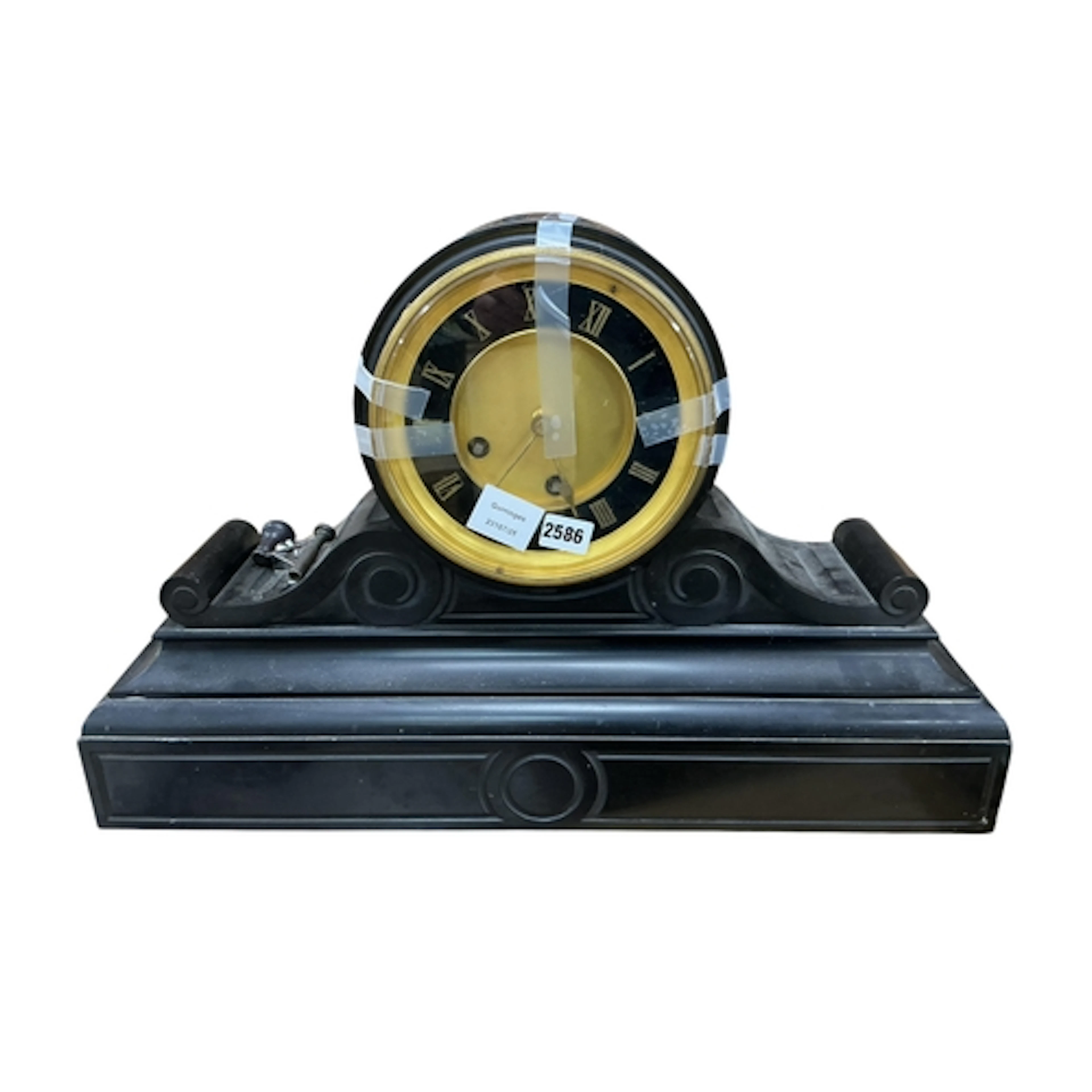 A late 19th century black marble drum head mantel clock, bas...