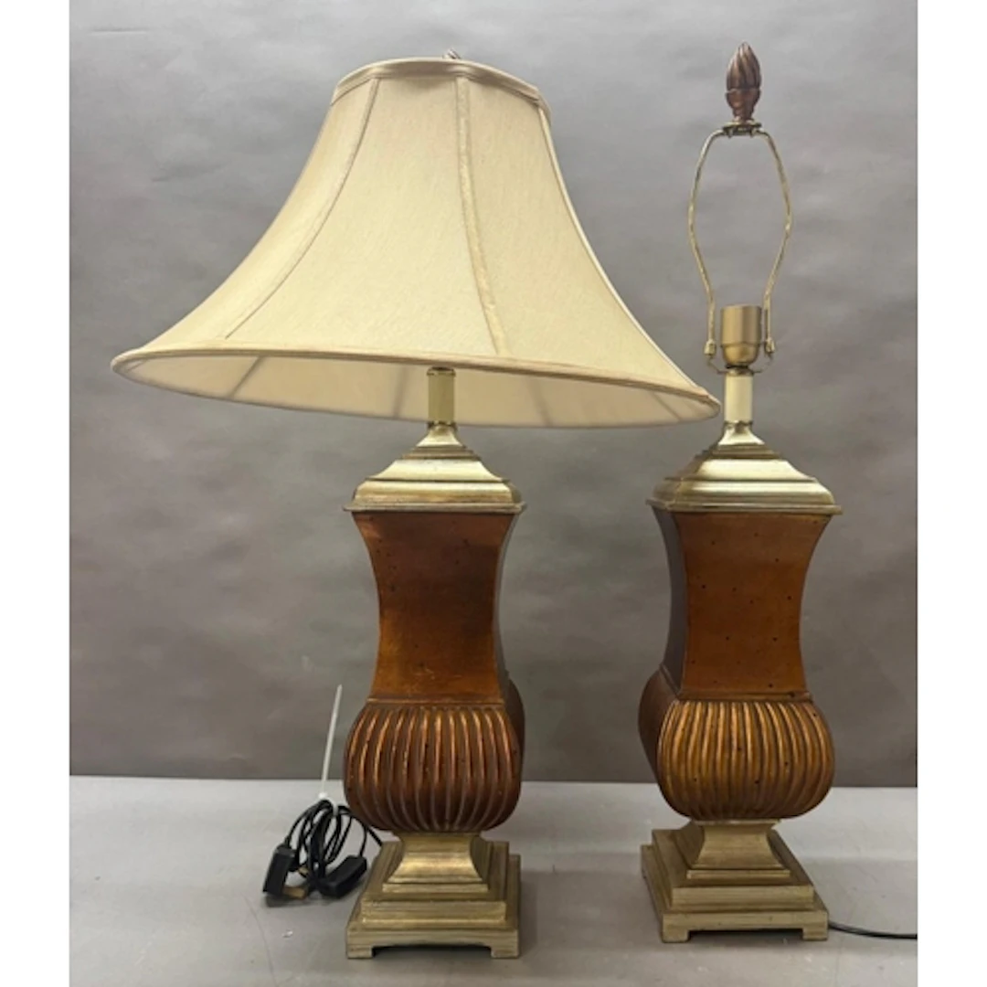 A pair of urn shaped wood tone fluted table lamps. Height 86...