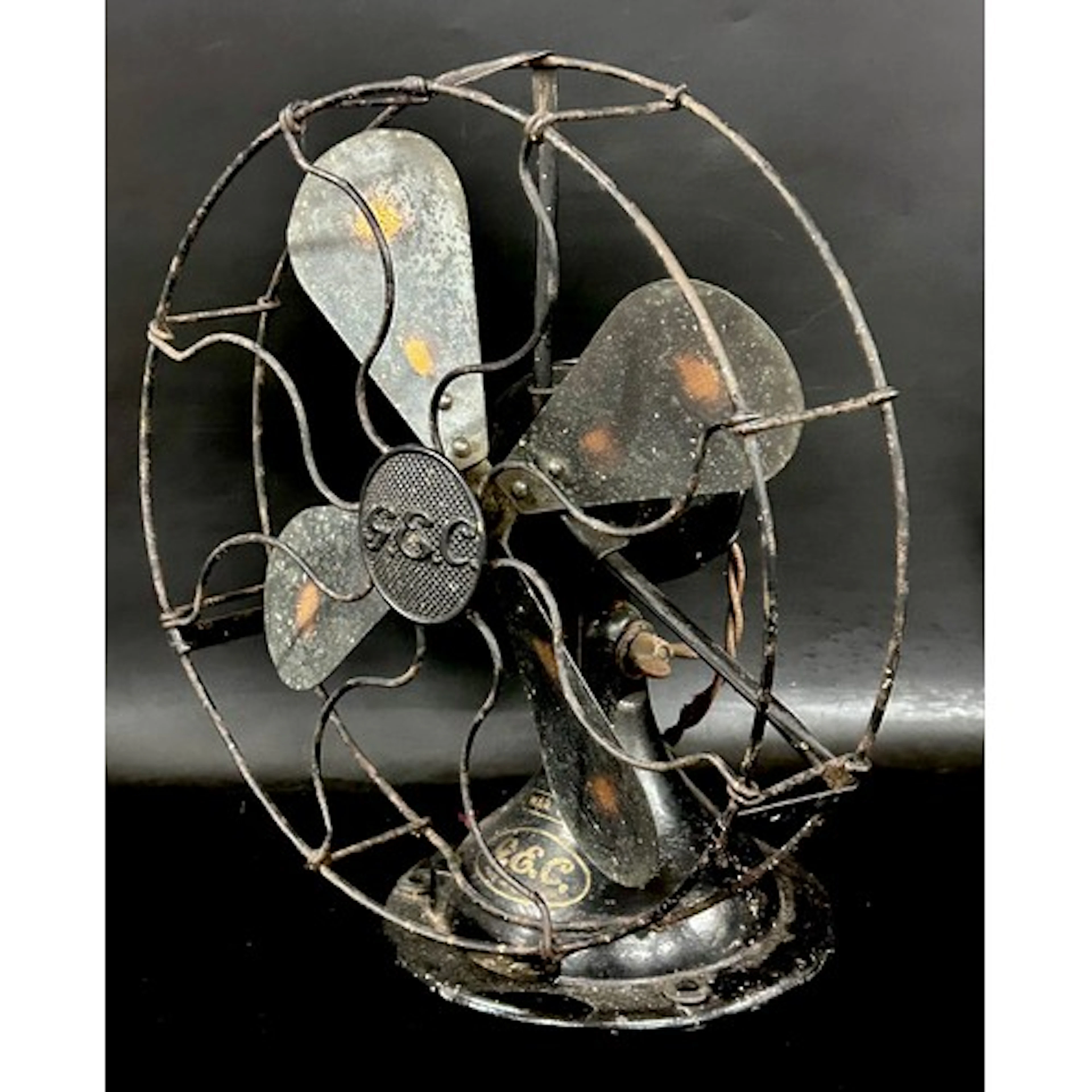 A GEC (General Electric Company) industrial metal fan, circa...