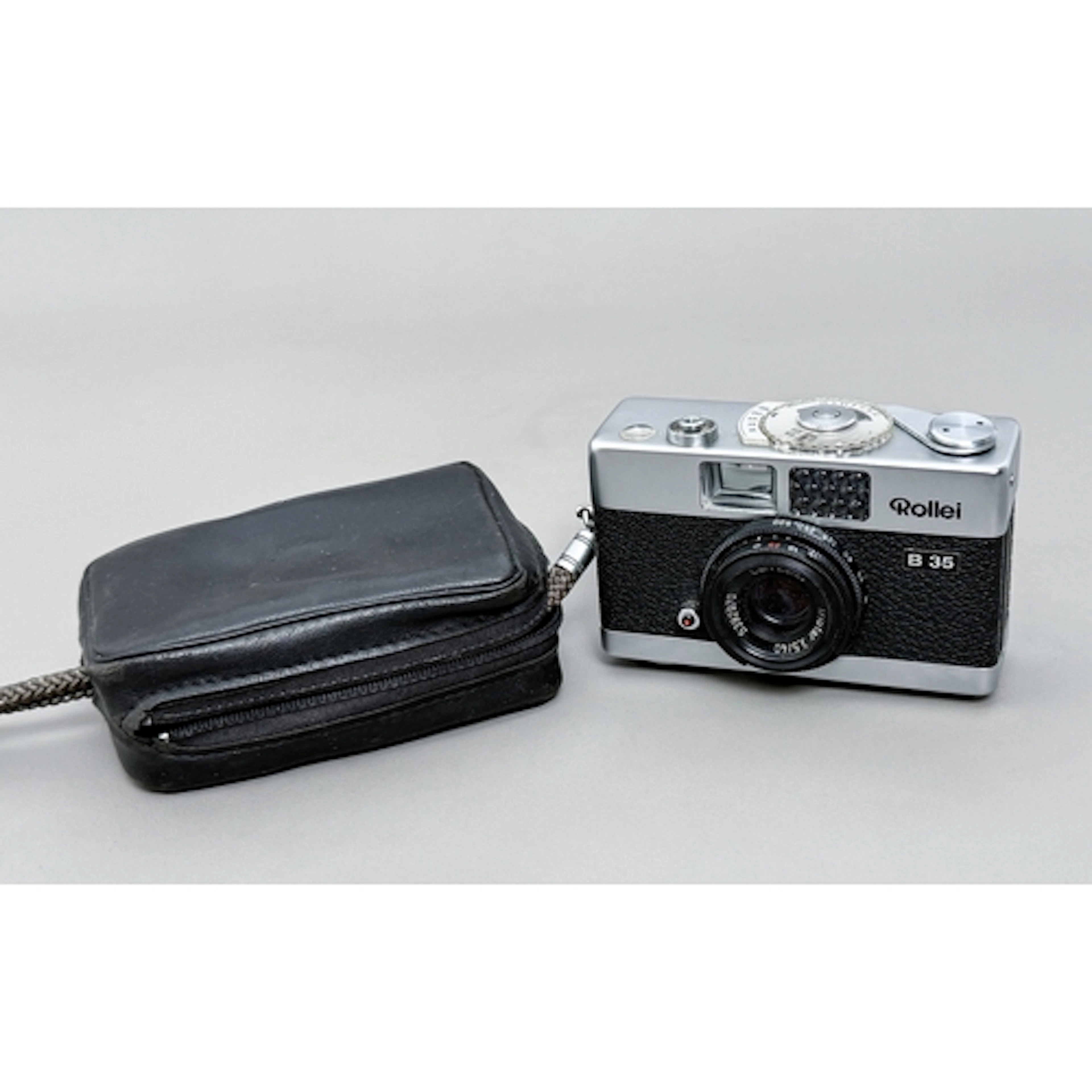A Rollei B 35 camera in a protective case - made by Rollei S...