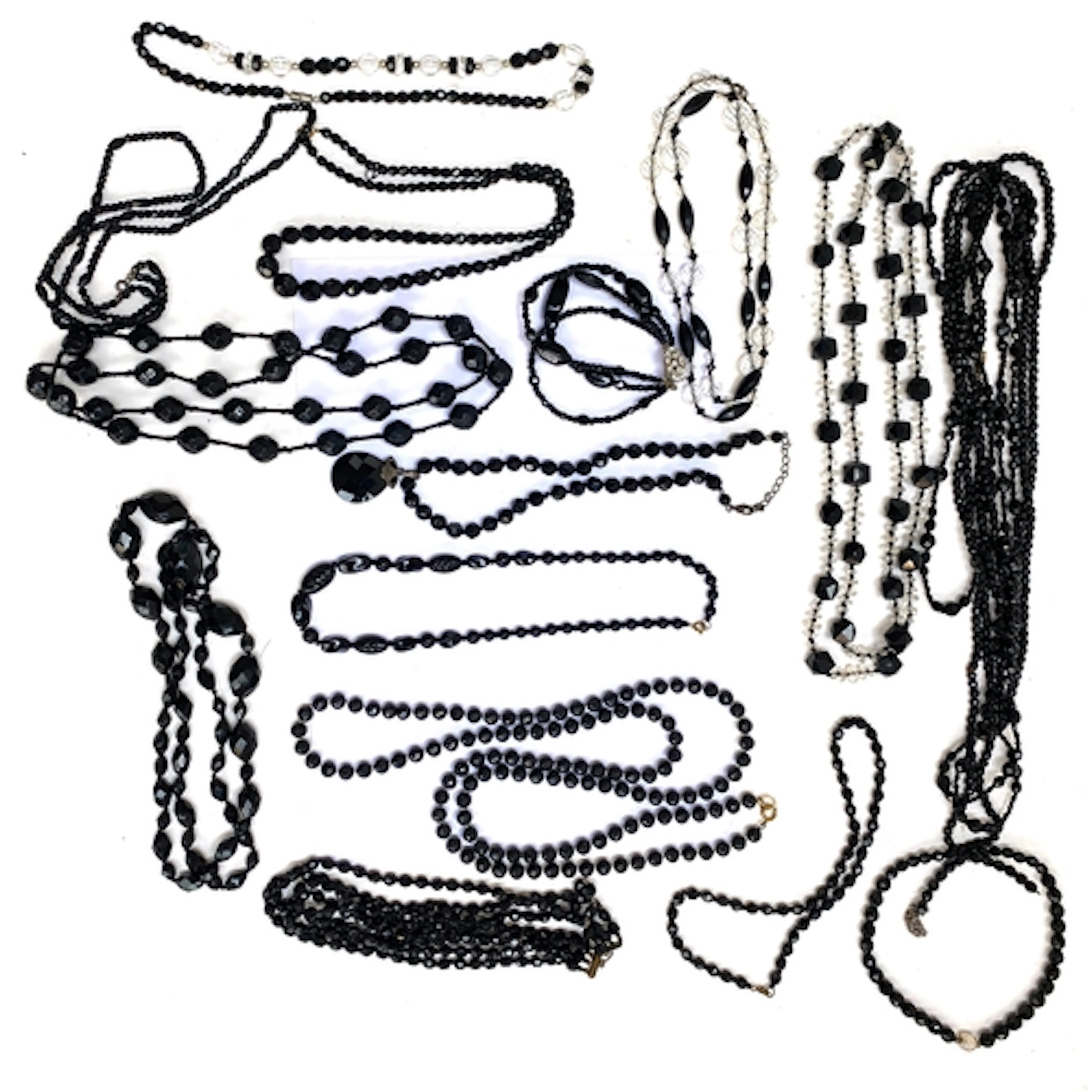 A collection of vintage French jet and other black beaded ne...