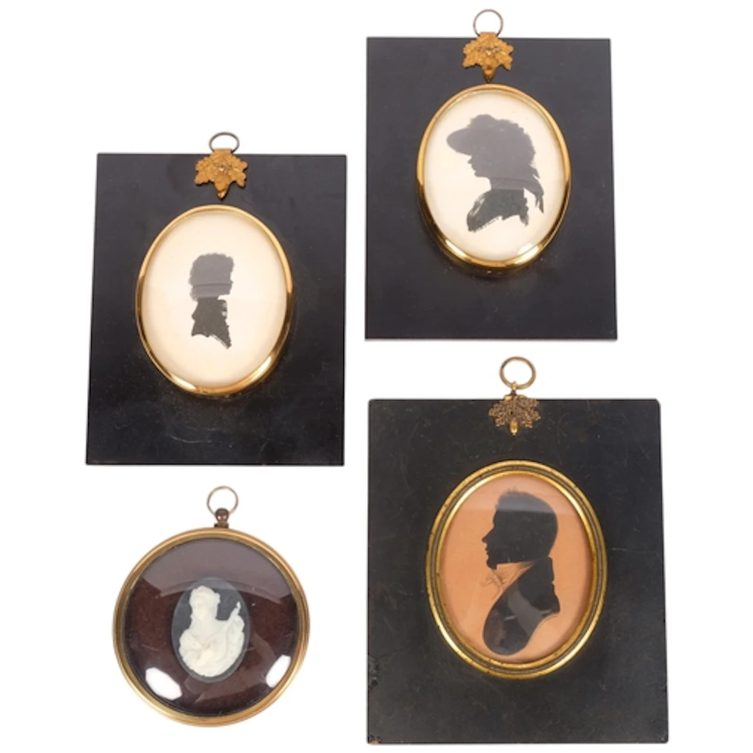 A group of Antique silhouette miniatures, ebony framed with ...