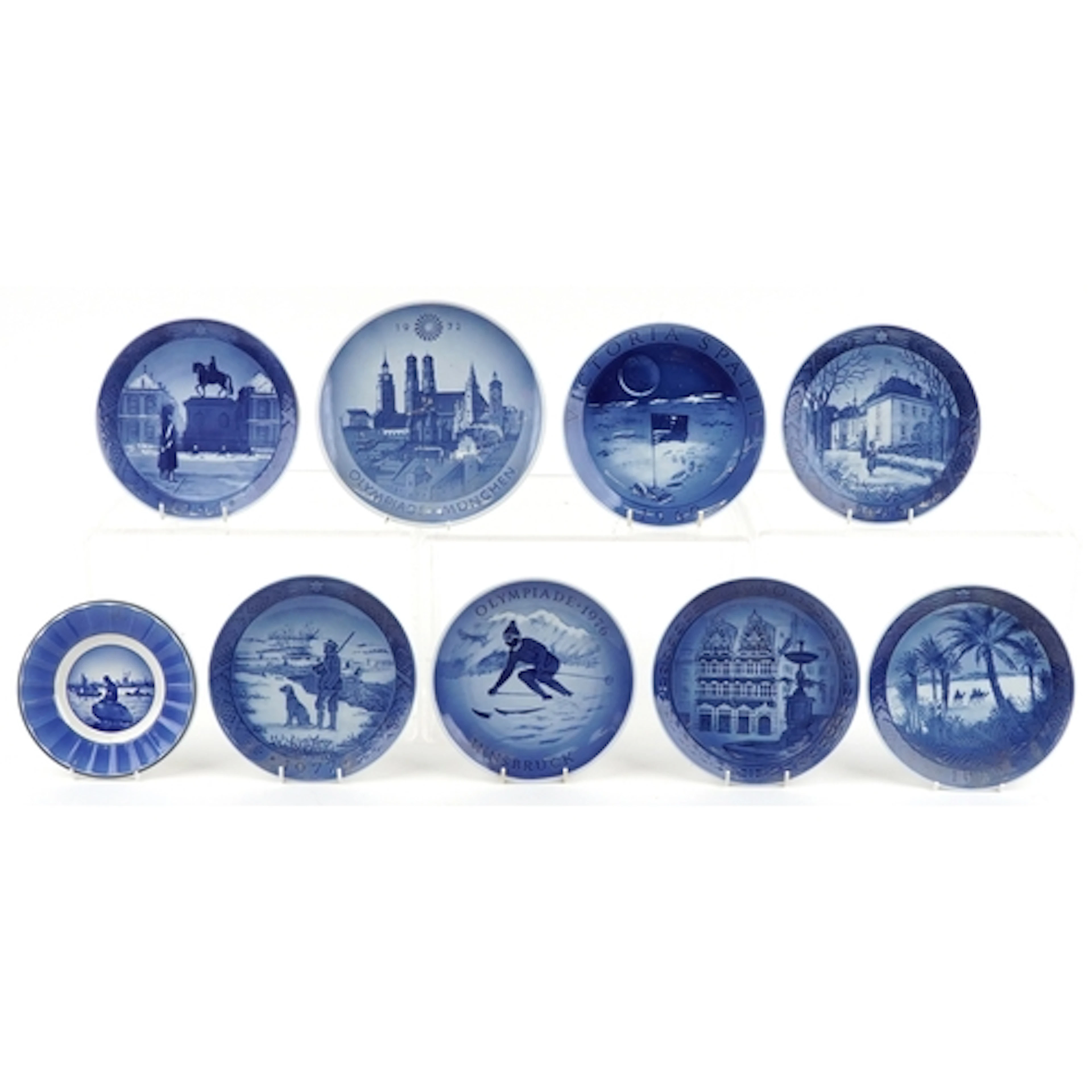 Royal Copenhagen, nine blue and white porcelain wall plates ...