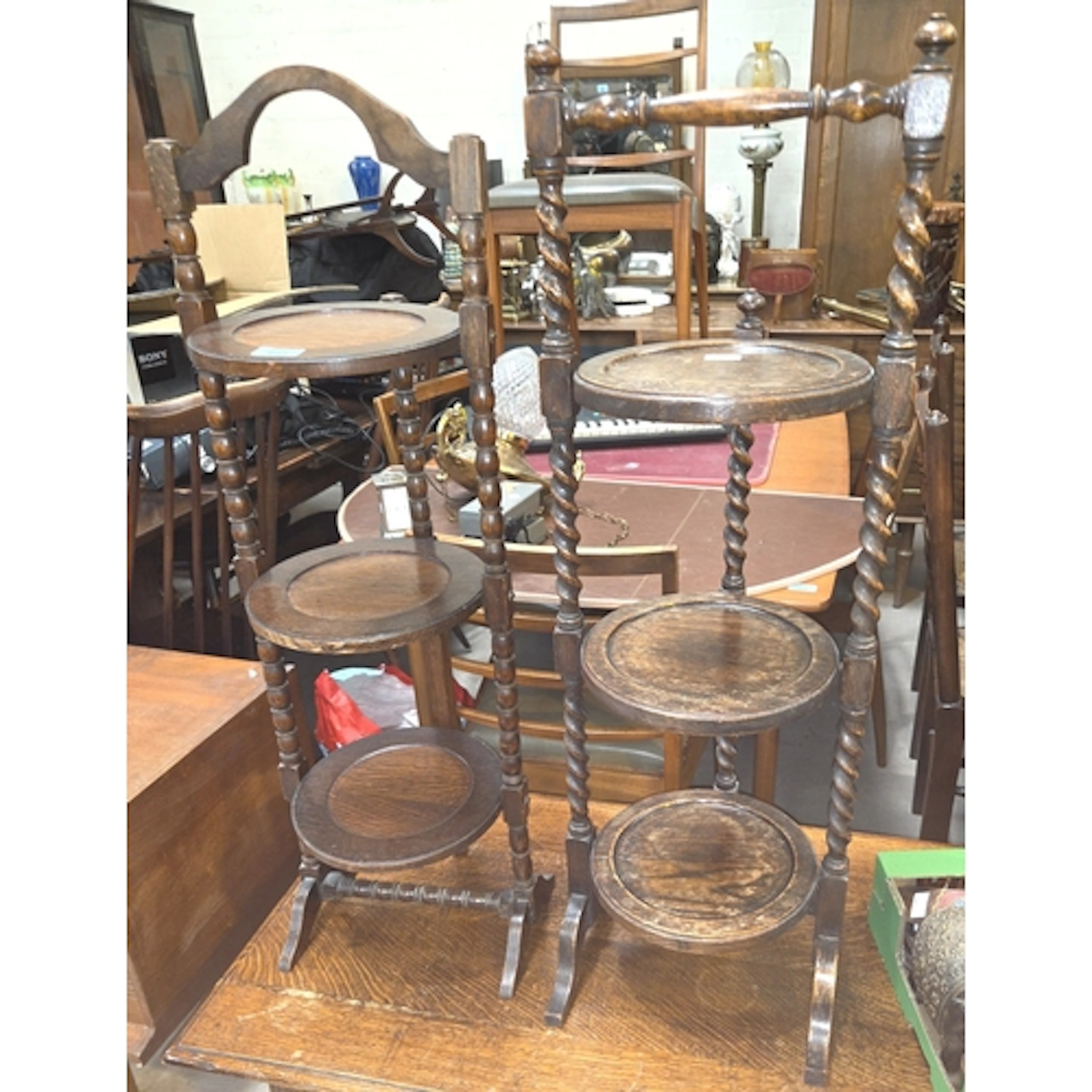 2 late 19th/early 20th century oak cake stands, one with bar...