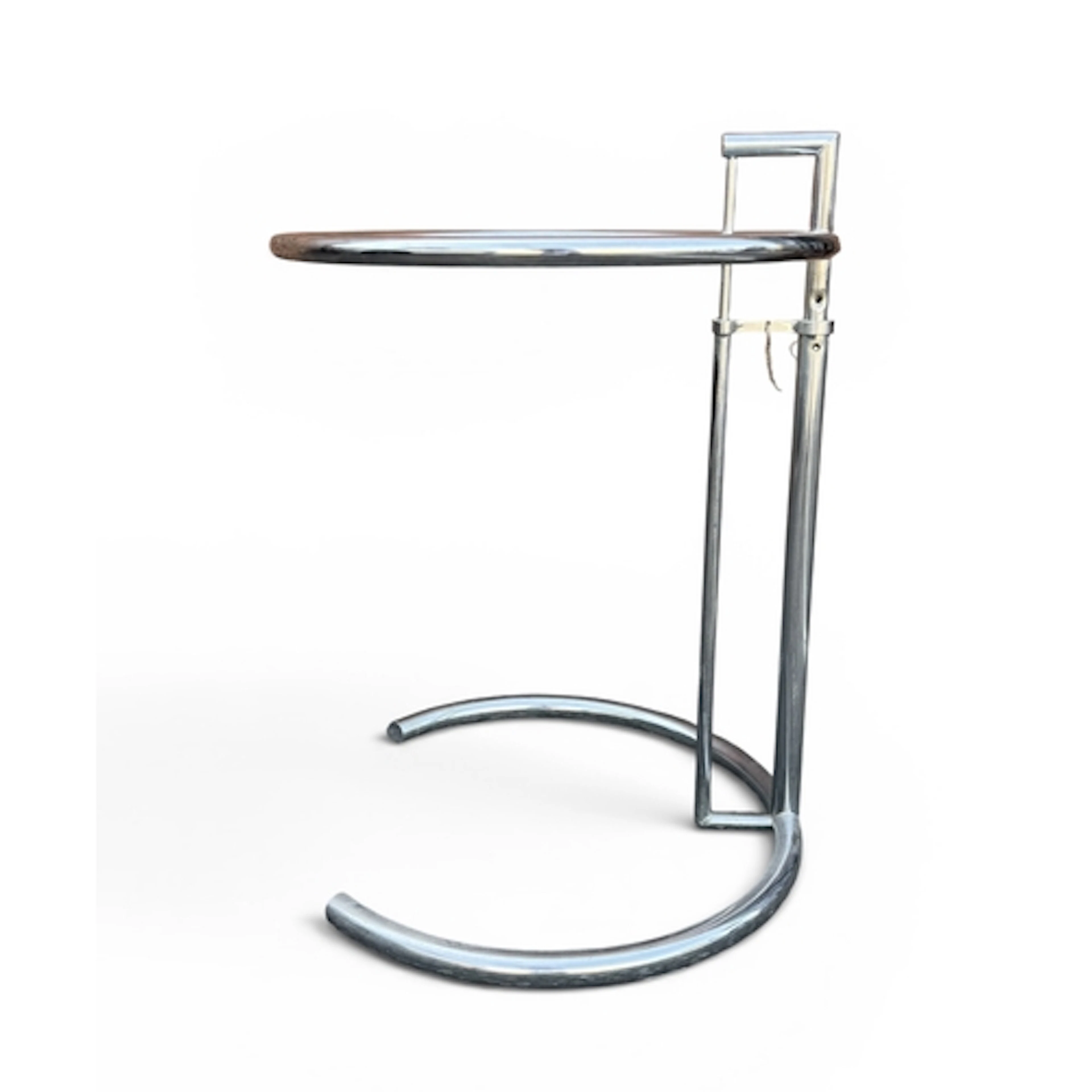 EILEEN GREY (IRISH 1878-1976): A TWO TIER GLASS SIDE TABLE...