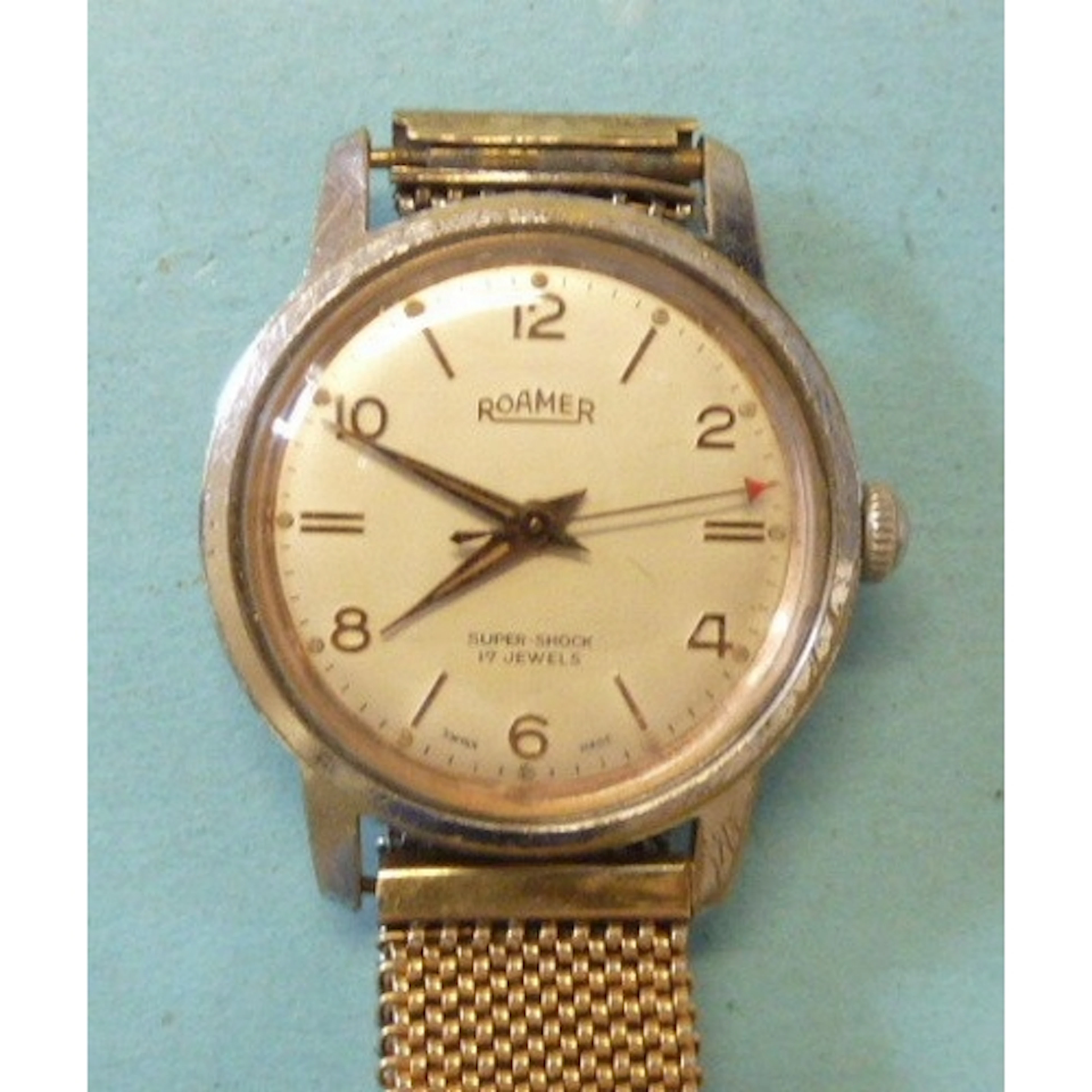 A gentleman's Roamer Super Shock wrist watch, (winds, sets a...