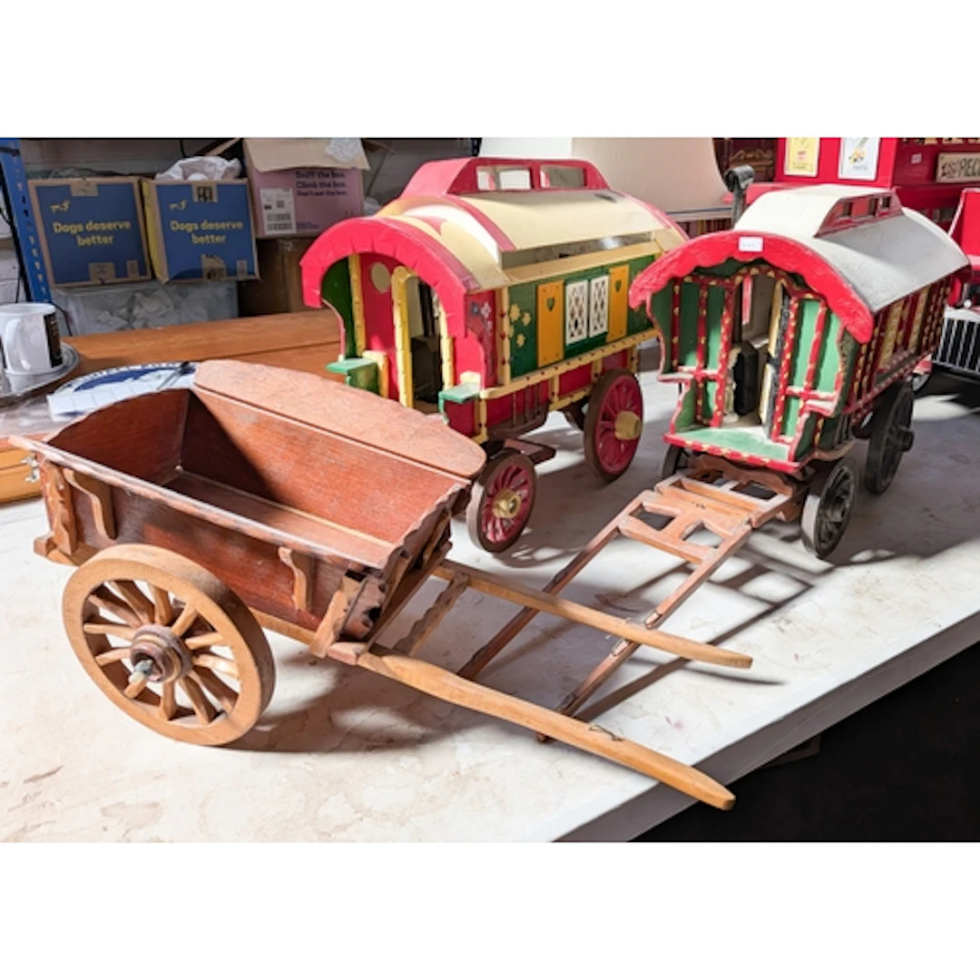 Two wooden handmade and painted gypsy caravans and a trailer...
