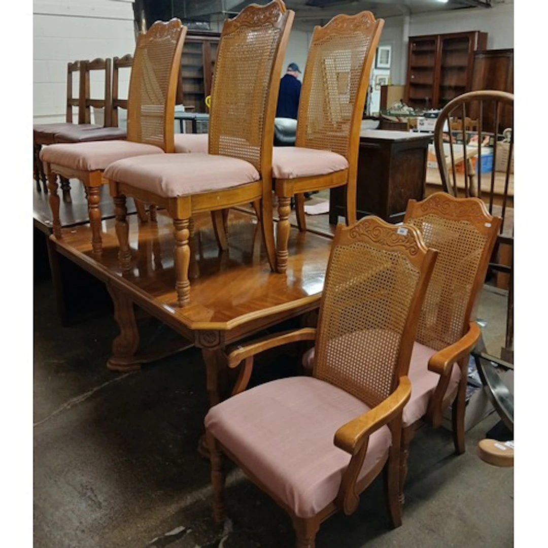 Set of six cane back dining chairs and a matching extending ...