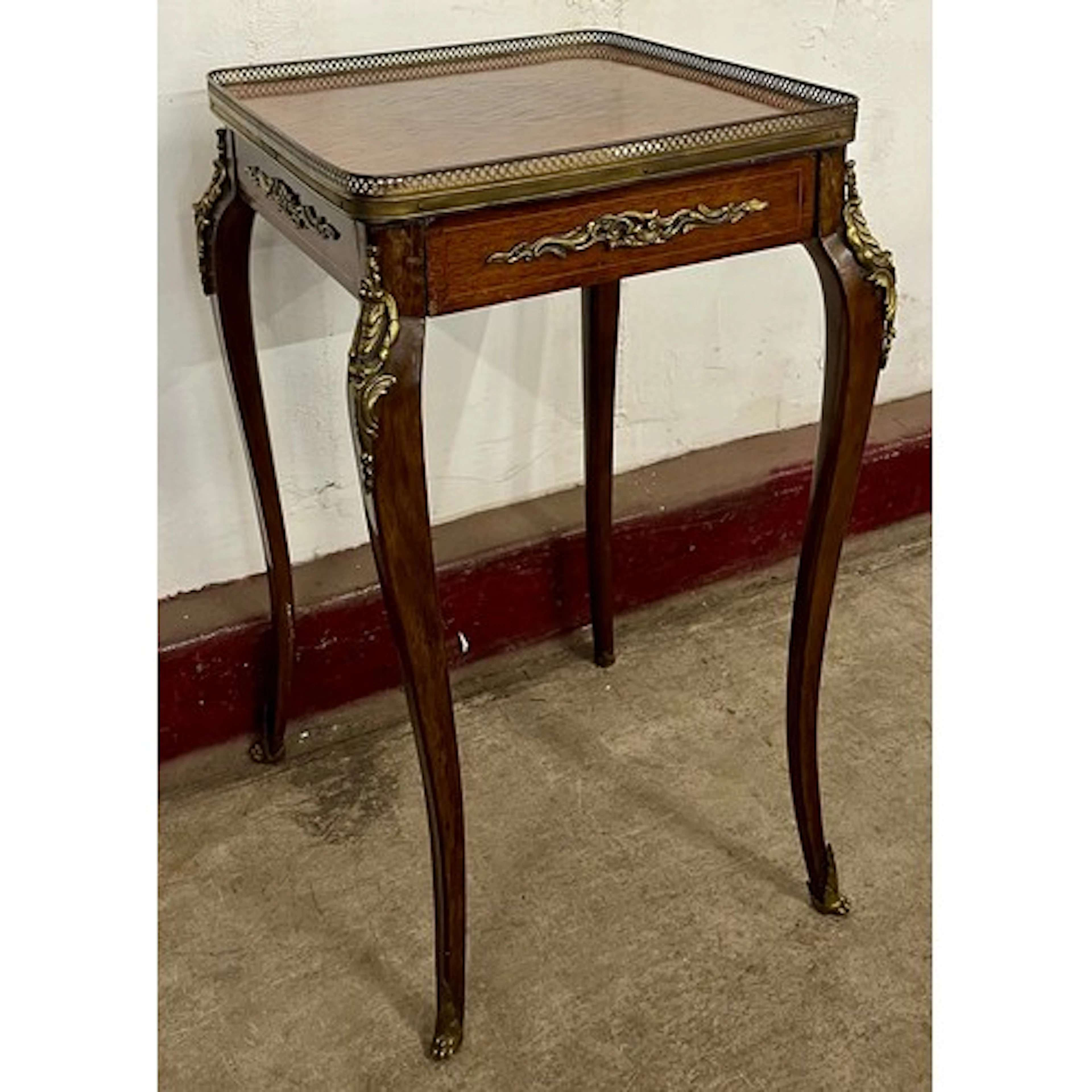 A French Louis XV style kingwood and gilt metal mounted side...