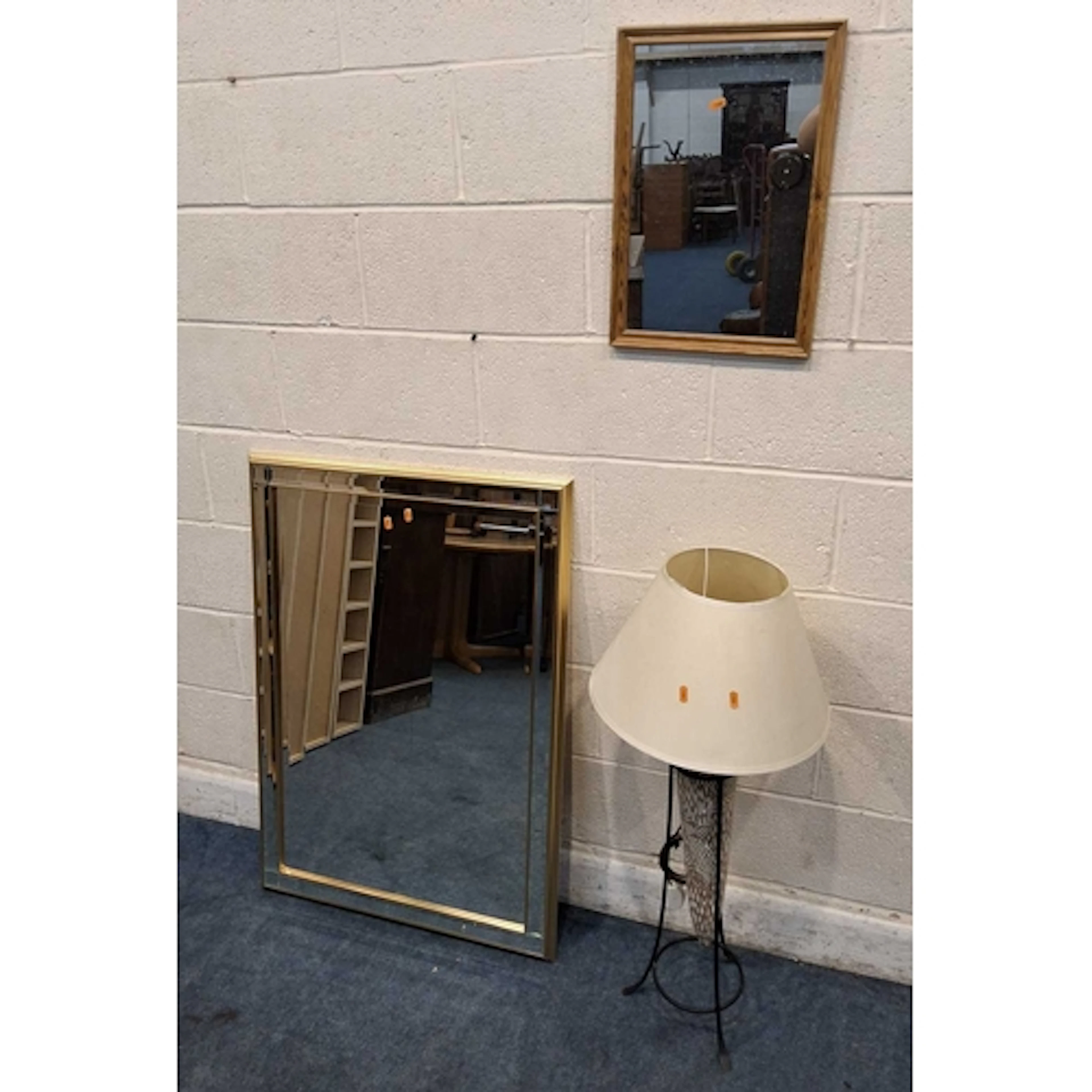 A MODERN BEVELLED EDGE WALL MIRROR, another mirror, along wi...