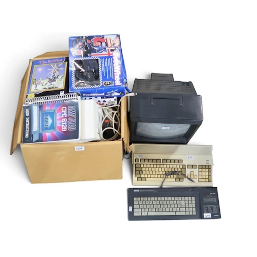 Vintage computing, comprising an Amstrad CPC6128 console and...