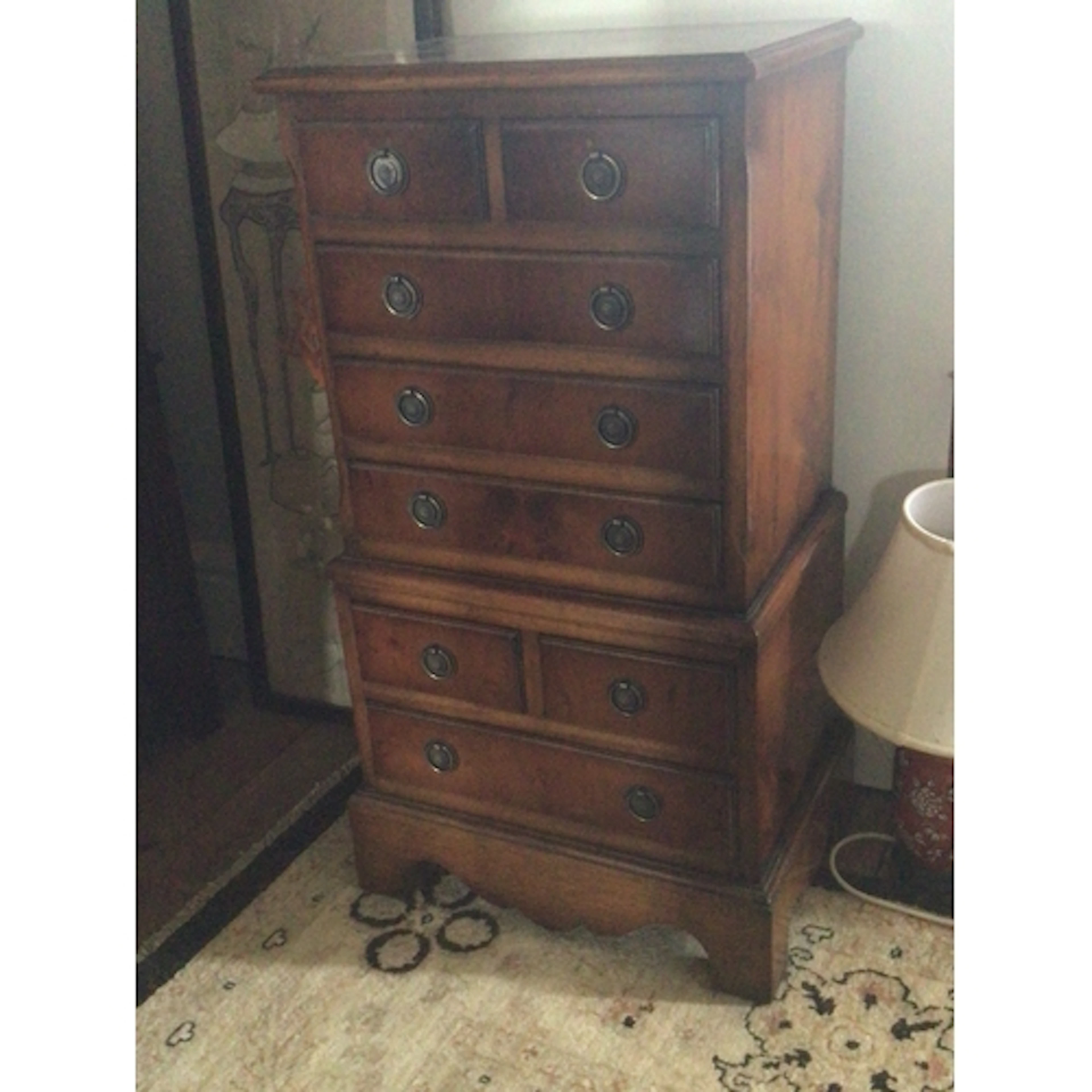A modern small walnut flight of drawers with two tiers with ...
