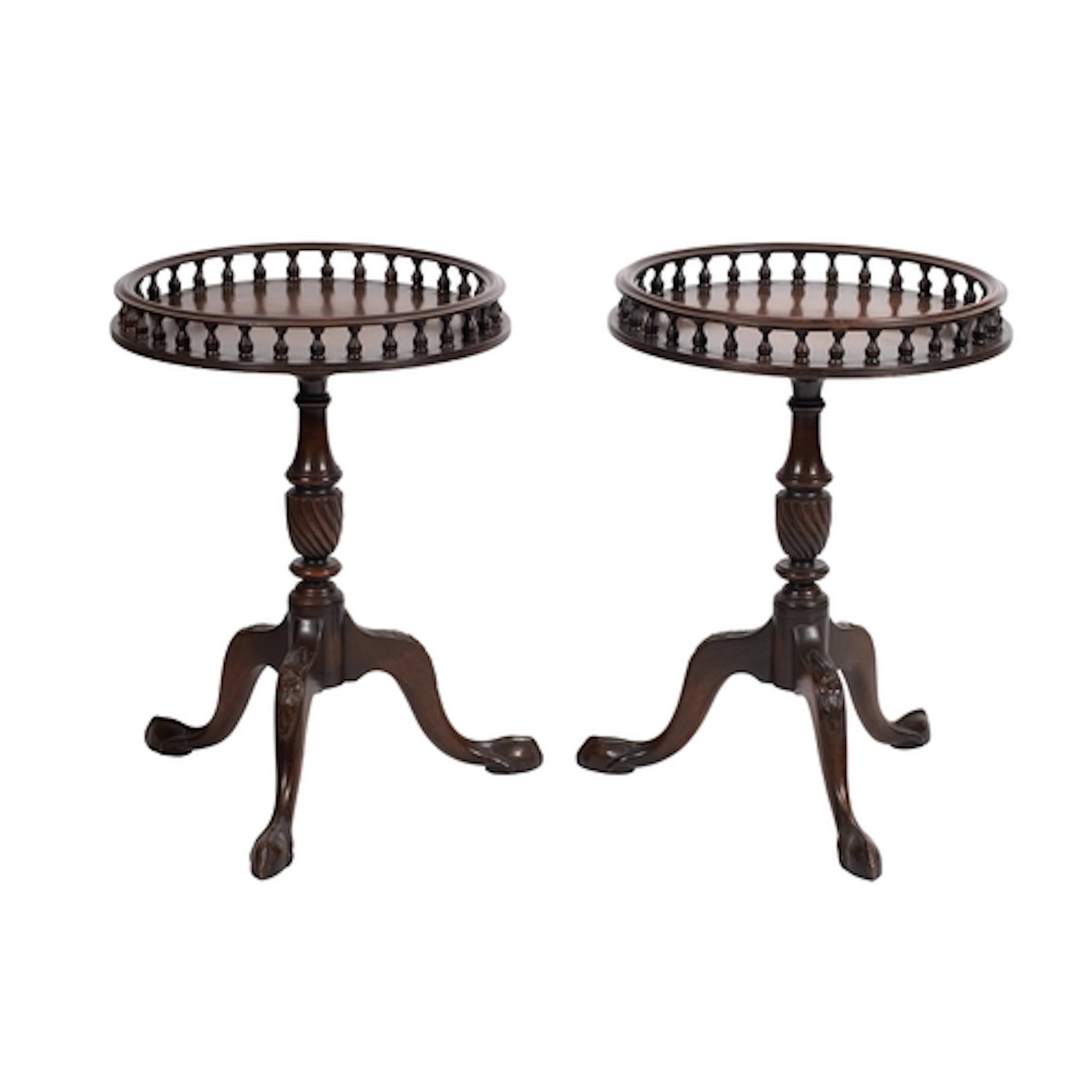 A pair of mahogany tripod stands in George III style, early ...