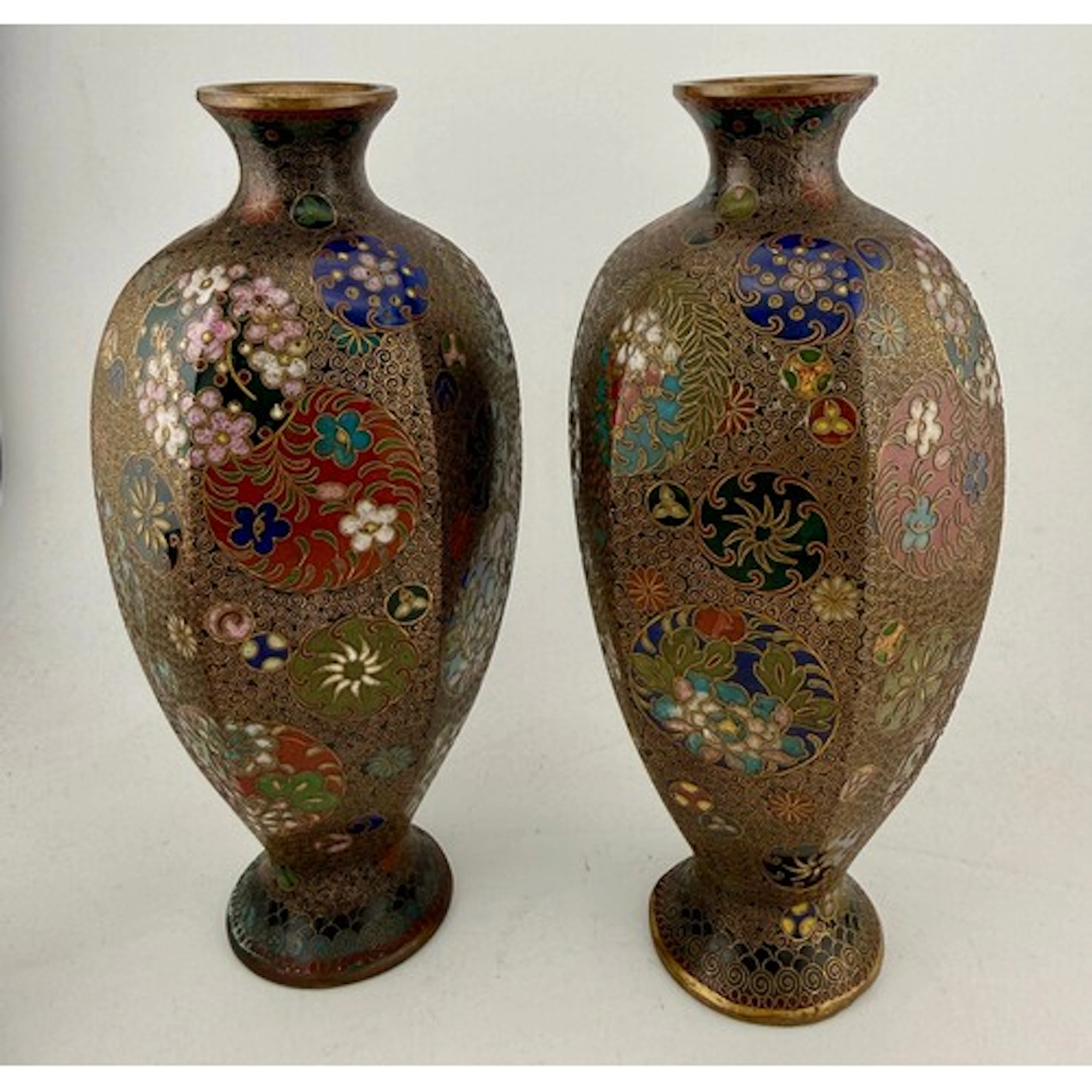 A pair of oriental cloisonné enamel vases. 18.5cm h.