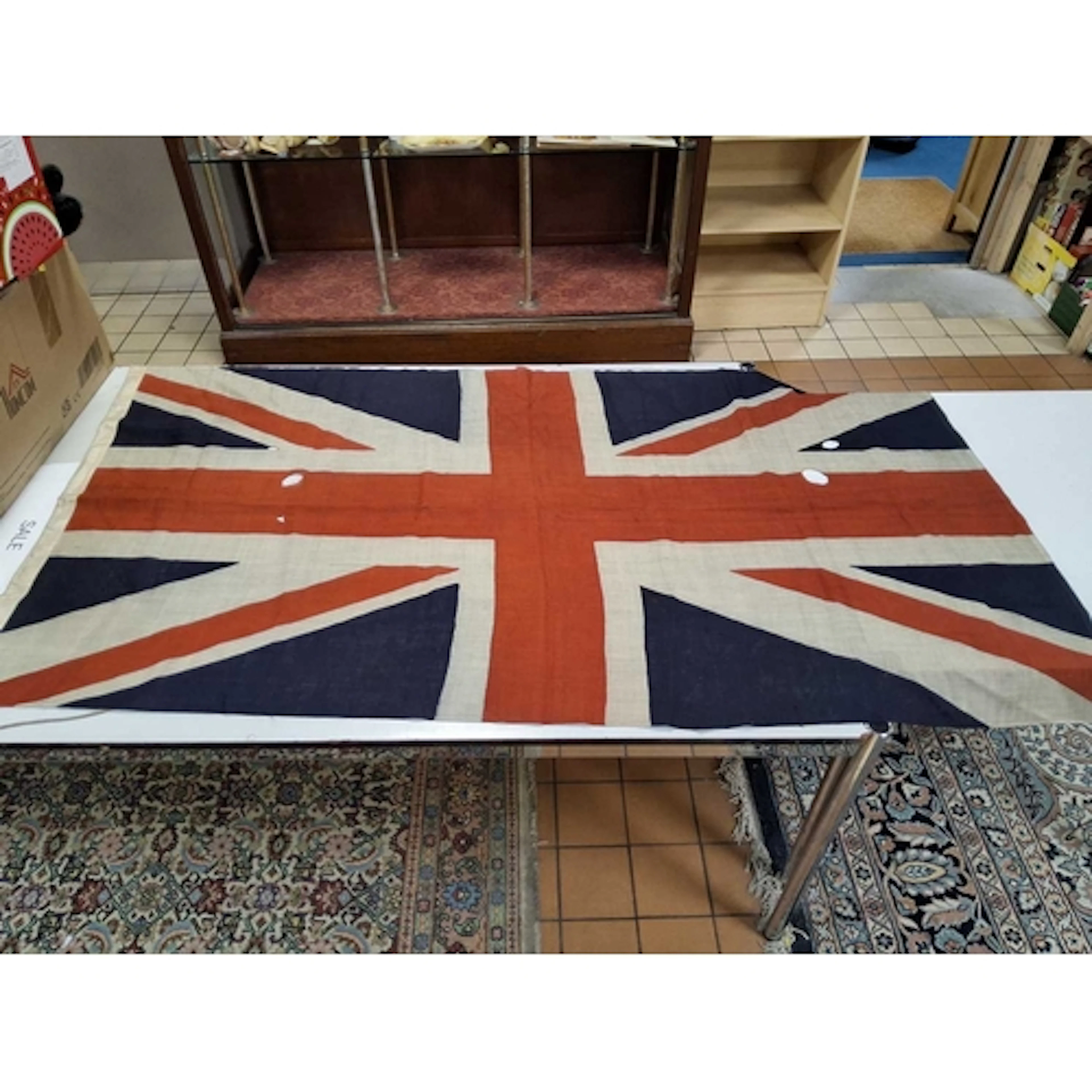 A LOT OF TWO LARGE FLAGS comprising a Union Jack 174cm x 95c...