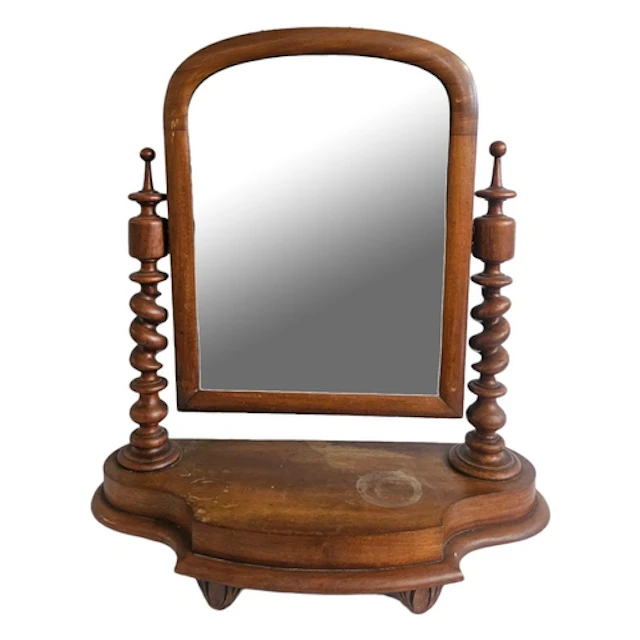 A VICTORIAN STAINED PINE DRESSING TABLE MIRROR Having barle...